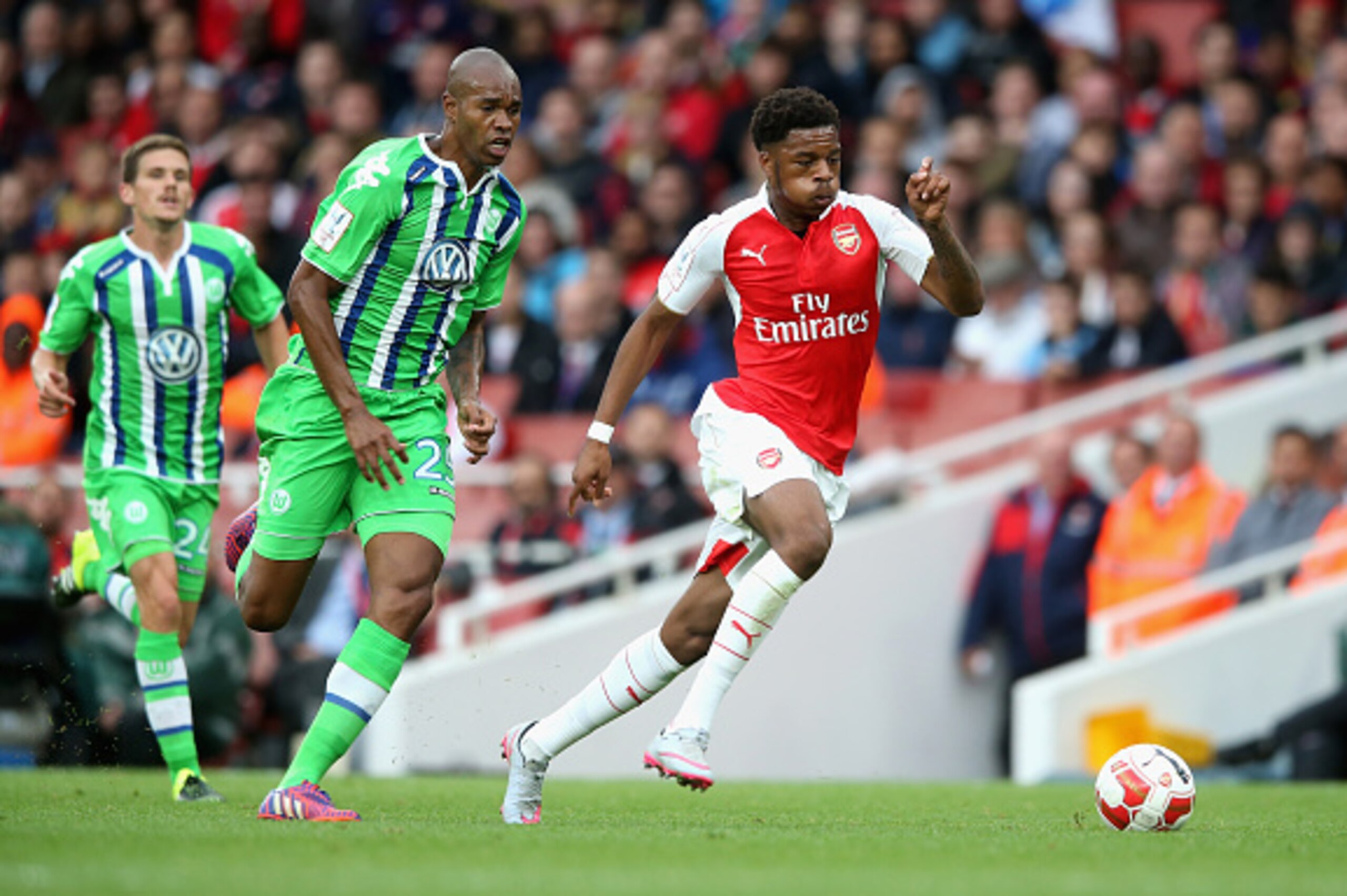 LONDON, ENGLAND - JULY 26:  Chuba Akpom of Arsenal moves away from Naldo during the Emirates Cup match between Arsenal and VfL Wolfsburg at the Emirates Stadium on July 26, 2015 in London, England.  (Photo by David Rogers/Getty Images)