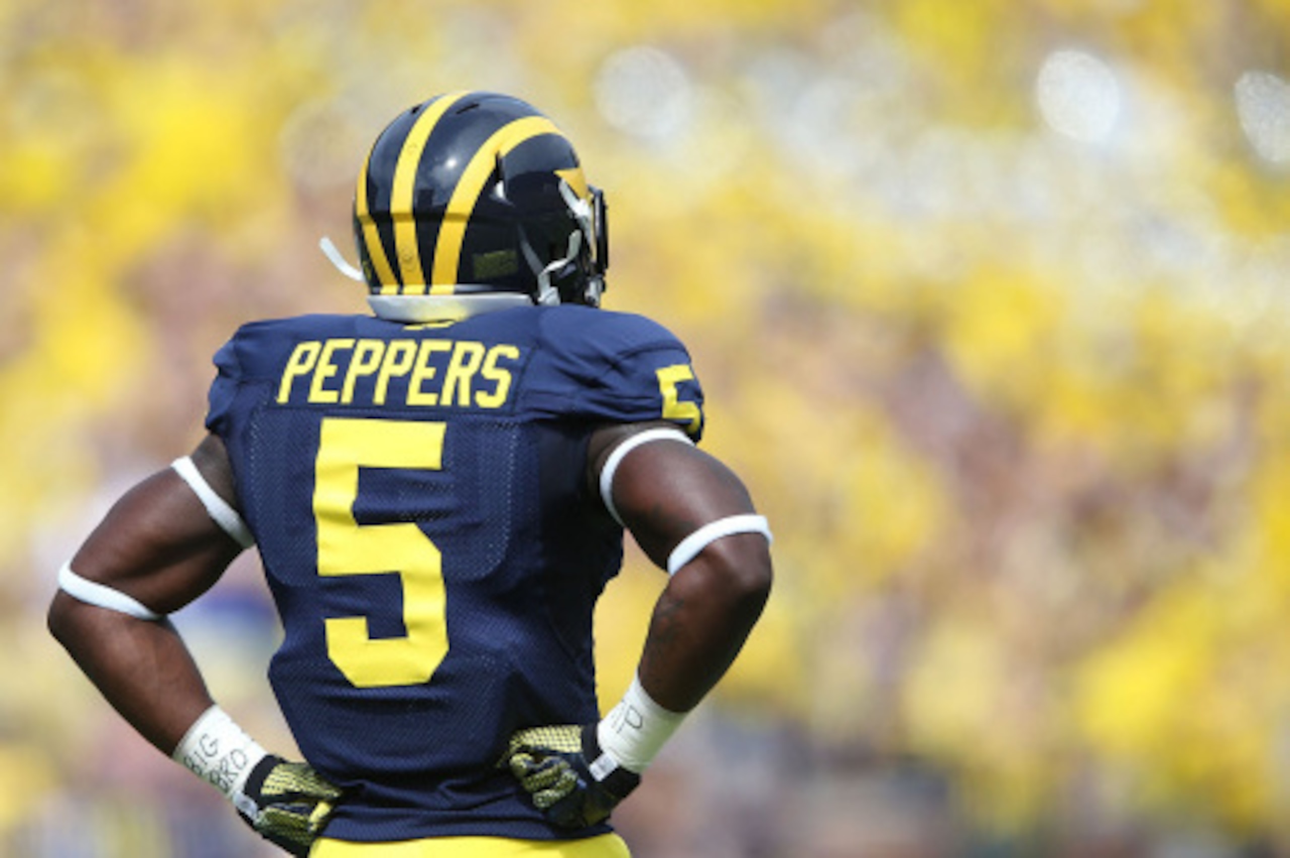 ANN ARBOR, MI - AUGUST 30:  Jabrill Peppers #5 of the Michigan Wolverines warms up prior to the start of the game against the Appalachian State Mountaineers on August 30, 2014 in Ann Arbor, Michigan. The Wolverines defeated the Mountaineers 52-14.  (Photo