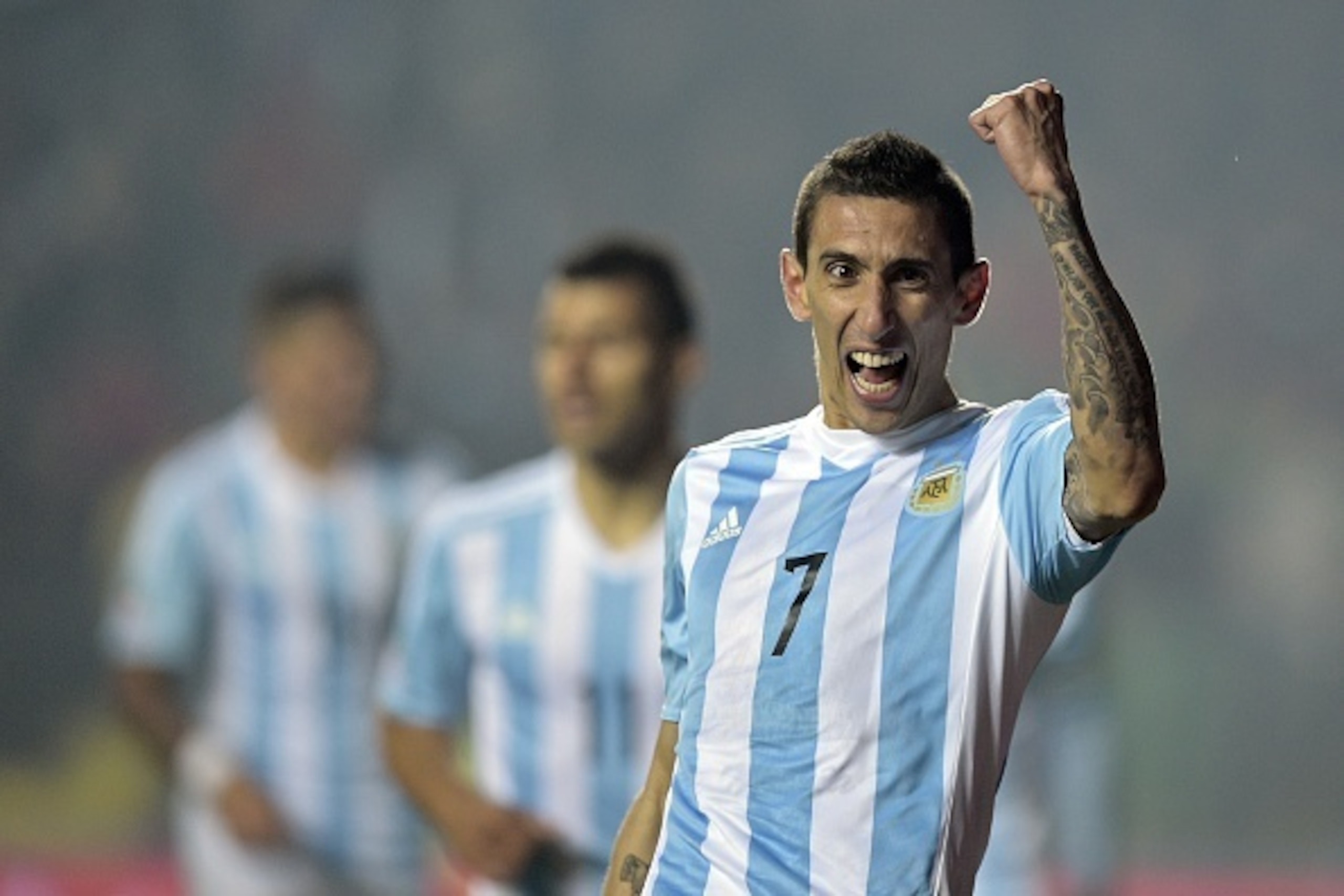 Argentina's forward Angel Di Maria celebrates after scoring against Paraguay during their Copa America semifinal football match in Concepcion, Chile on June 30, 2015.  AFP PHOTO / JUAN MABROMATA        (Photo credit should read JUAN MABROMATA/AFP/Getty Im