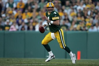 GREEN BAY, WI - AUGUST 19:  Quaterback Brett Favre #4 of the Green Bay Packers scrambles with the ball during the preseason game against the Atlanta Falcons on August 19, 2006 at Lambeau Field in Green Bay, Wisconsin. The Packers won 38-10. (Photo by Jona