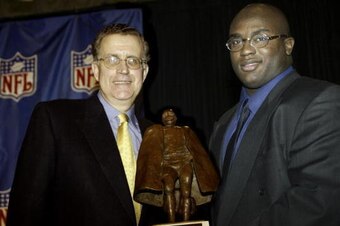NFL Commissioner Paul Tagliabue with the 2003 NFL Man of the Year Award winner Will Shields of the Kansas City Chiefs before Super Bowl XXXVIII at Reliant Stadium in Houston, Texas on January 30, 2004.  The New England Patriots defeated the Carolina Panth