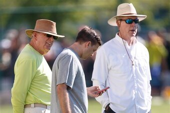 Wolf (left), with Thompson (right) and son Eliot (middle)