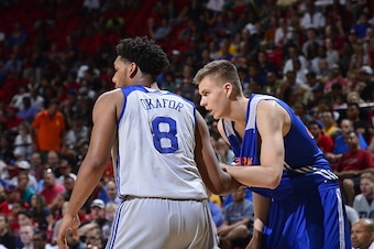 LAS VEGAS, NV - JULY 14: Jahlil Okafor #8 of the Philadelphia 76ers and Kristaps Porzingis #46 of the New York Knicks guard each other during the 2015 NBA Las Vegas Summer League game on July 14, 2015 at the Thomas & Mack Center in Las Vegas, Nevada. NOTE