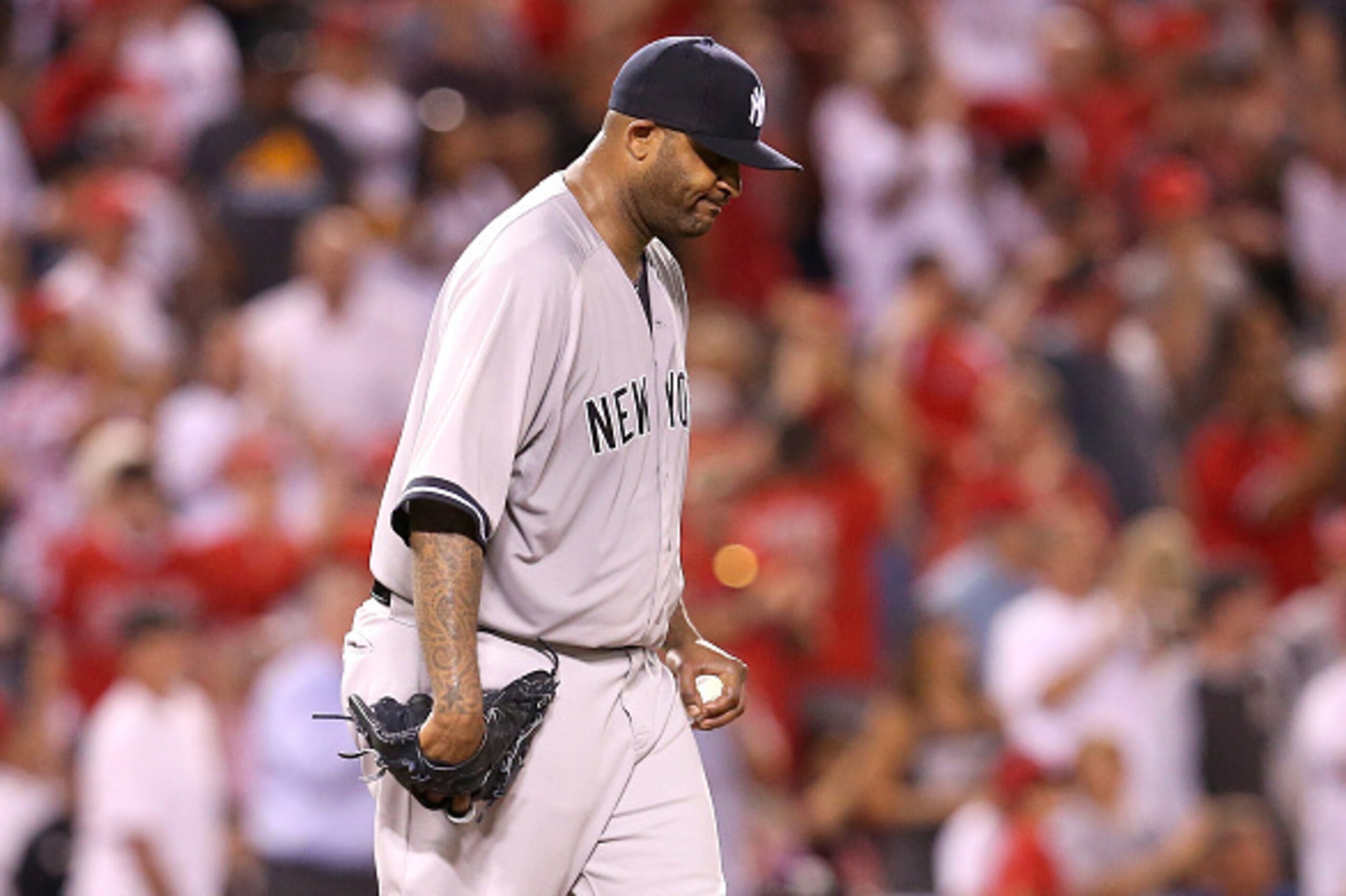 ANAHEIM, CA - JUNE 29:  Starting pitcher CC Sabathia #52 of the New York Yankees reacts after giving up a solo home run to C.J. Cron #0 of the Los Angeles Angels of Anaheim in the seventh inning at Angel Stadium of Anaheim on June 29, 2015 in Anaheim, Cal