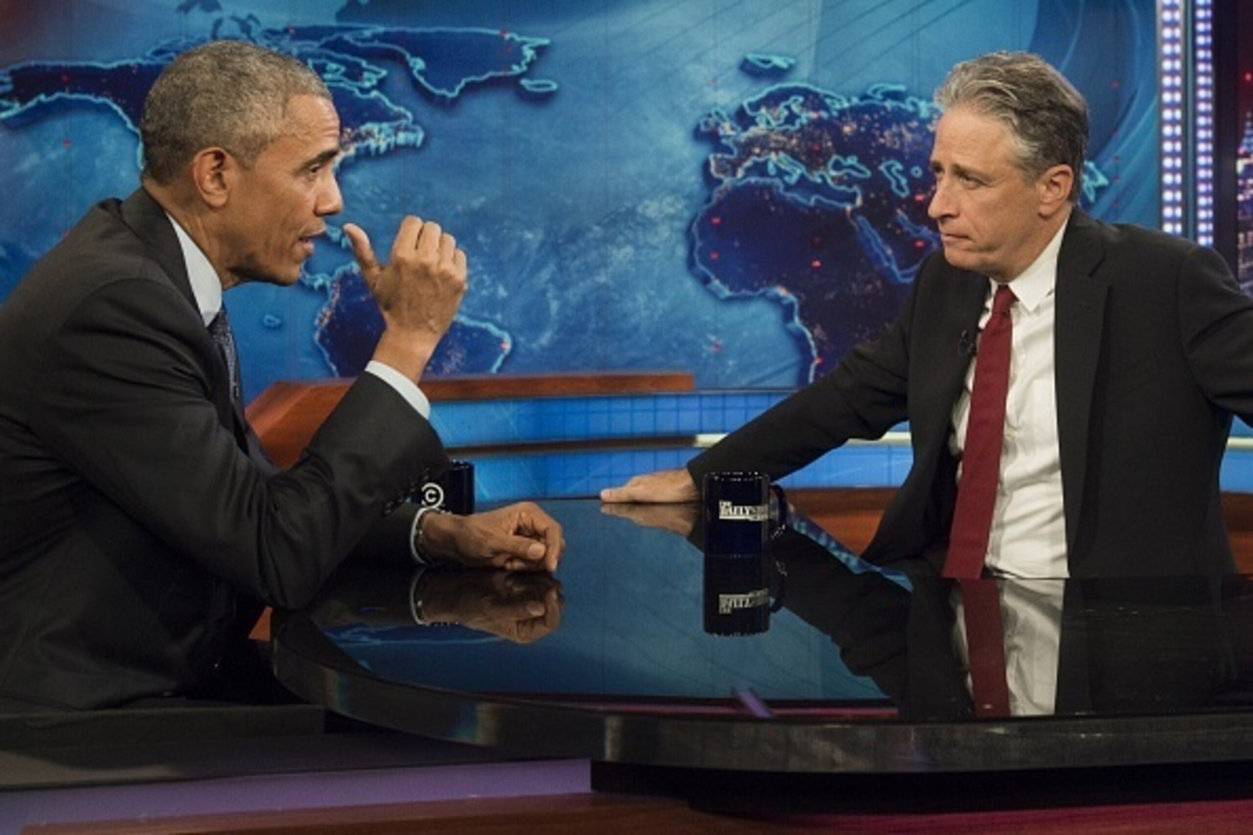 US President Barack Obama speaks with Jon Stewart, host of 'The Daily Show with Jon Stewart,' during a taping of the show in New York, July 21, 2015. The appearance marks Obama's third time on the show as President, and seventh overall. AFP PHOTO / SAUL L