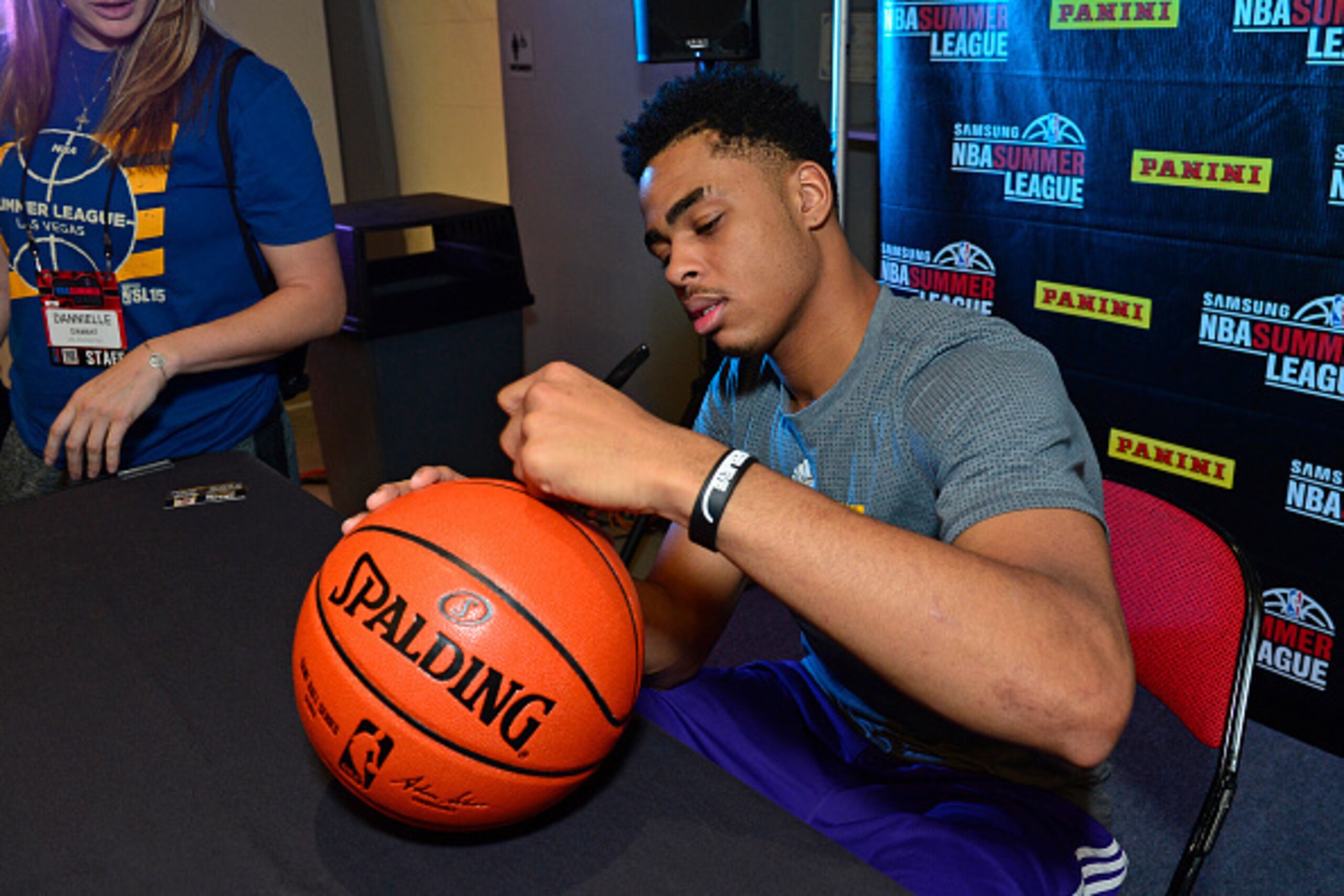 LAS VEGAS, NV - JULY 15:  D'Angelo Russell #1 of the Los Angeles Lakers signs autographs during the 2015 Summer League at The Cox Pavillion on July 15, 2015 in Las Vegas, Nevada. NOTE TO USER: User expressly acknowledges and agrees that, by downloading an