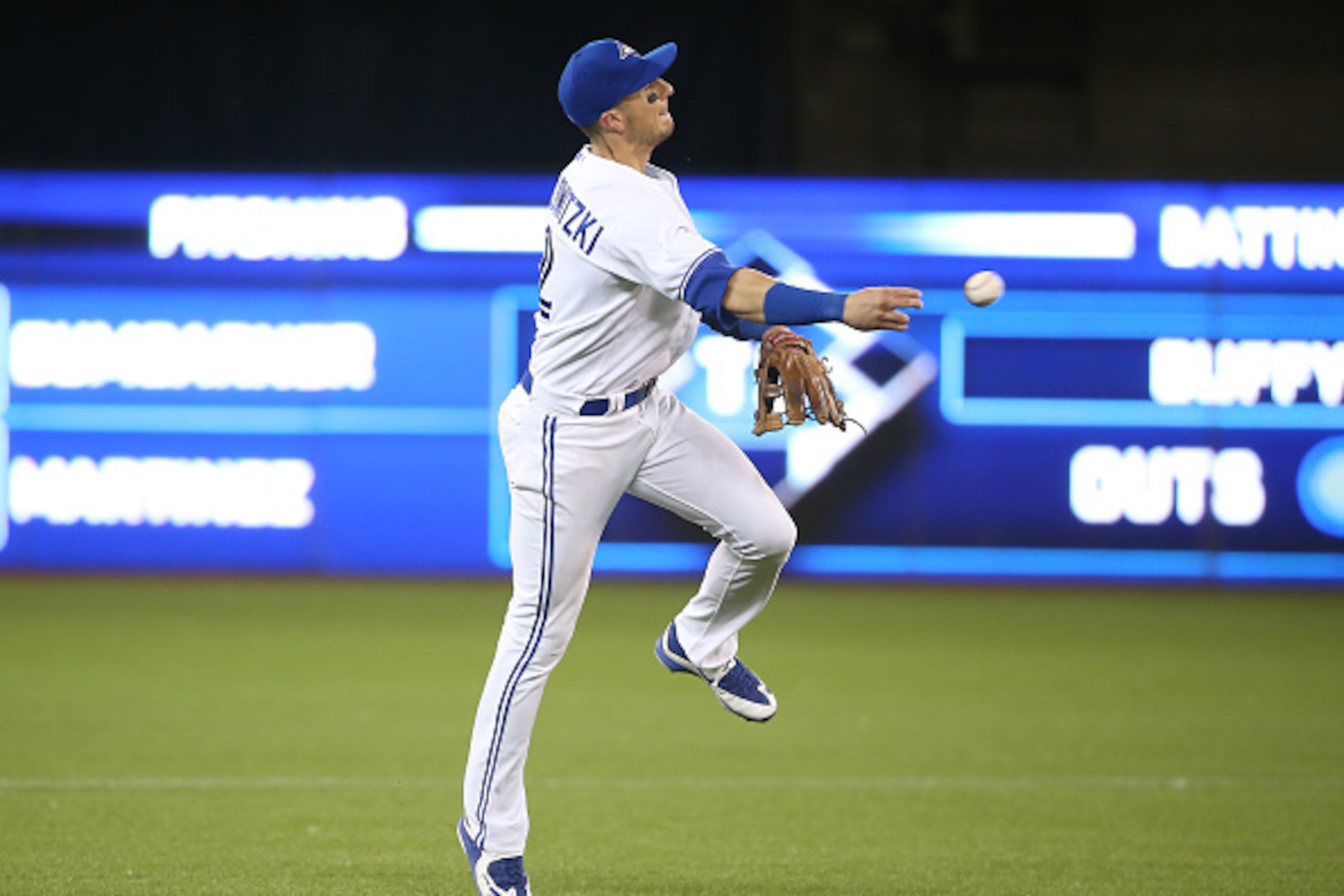 TORONTO, CANADA - JULY 31: Troy Tulowitzki #2 of the Toronto Blue Jays throws out the baserunner in the eighth inning during MLB game action against the Kansas City Royals on July 31, 2015 at Rogers Centre in Toronto, Ontario, Canada. (Photo by Tom Szczer
