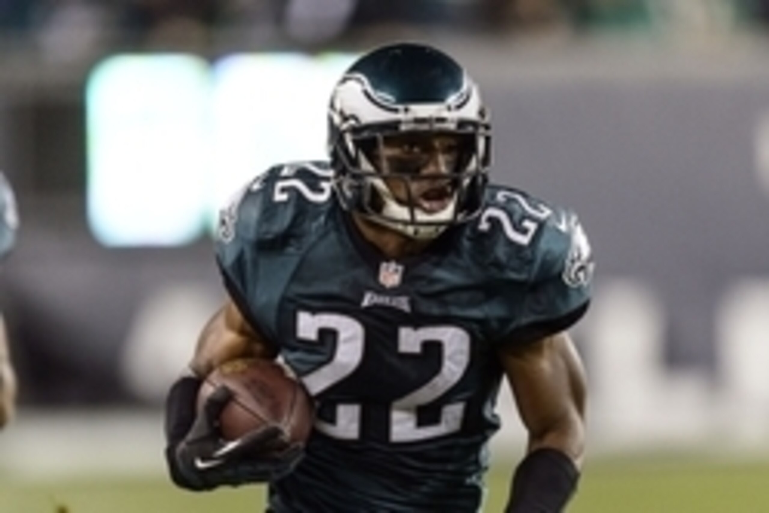 Dec 22, 2013; Philadelphia, PA, USA; Philadelphia Eagles cornerback Brandon Boykin (22) returns an interception for a touchdown during the fourth quarter against the Chicago Bears at Lincoln Financial Field. The Eagles defeated the Bears 54-11. Mandatory 