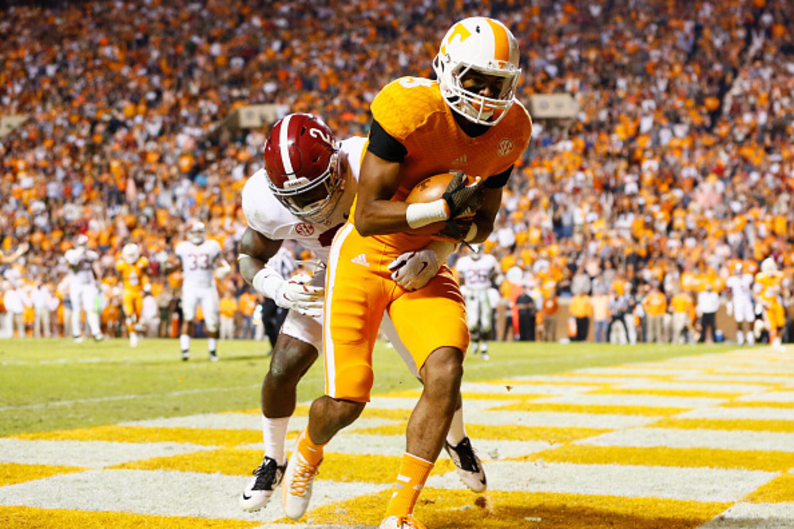 KNOXVILLE, TN - OCTOBER 25:  Josh Malone #3 of the Tennessee Volunteers pulls in this touchdown reception against Tony Brown #2 of the Alabama Crimson Tide at Neyland Stadium on October 25, 2014 in Knoxville, Tennessee.  (Photo by Kevin C. Cox/Getty Image