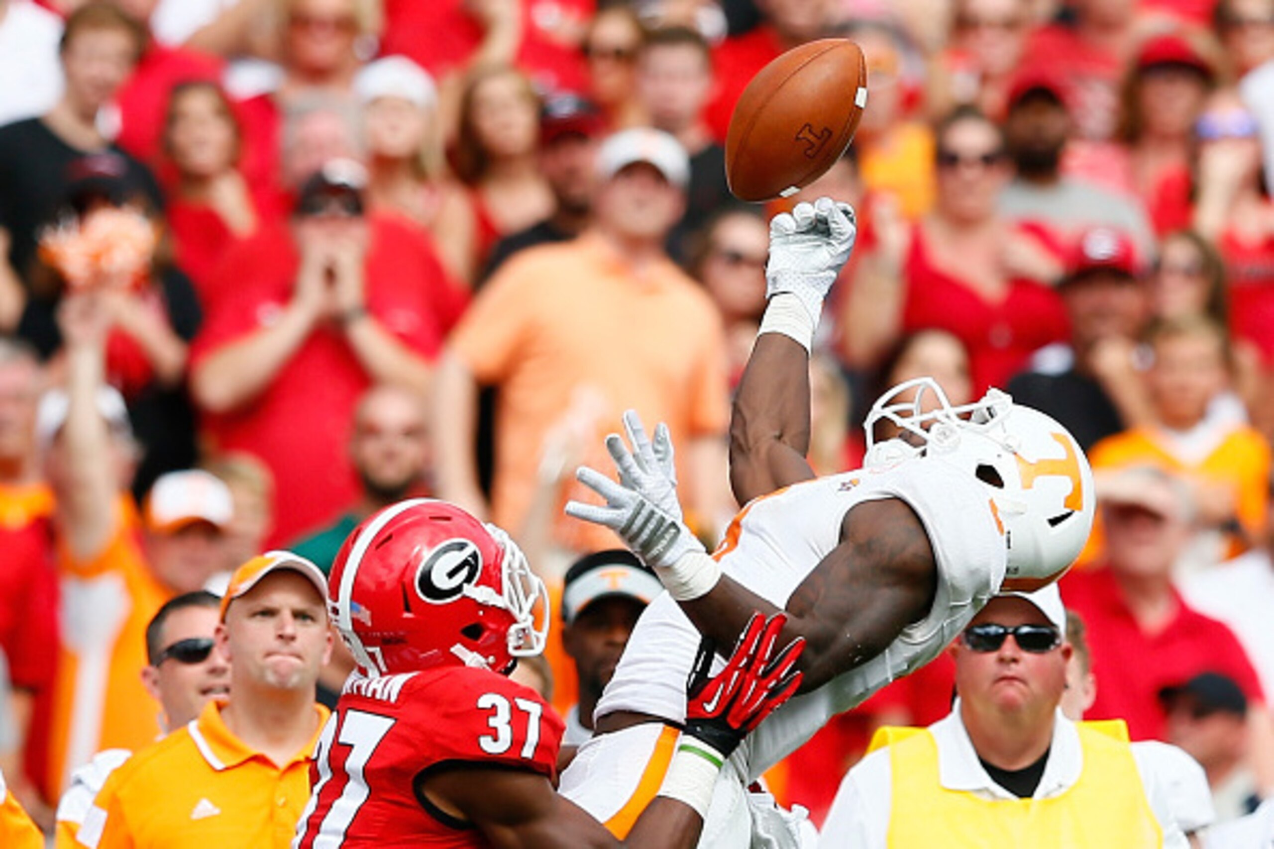 ATHENS, GA - SEPTEMBER 27:  Marquez North #8 of the Tennessee Volunteers fails to pull in this reception against Devin Bowman #37 of the Georgia Bulldogs at Sanford Stadium on September 27, 2014 in Athens, Georgia.  (Photo by Kevin C. Cox/Getty Images)