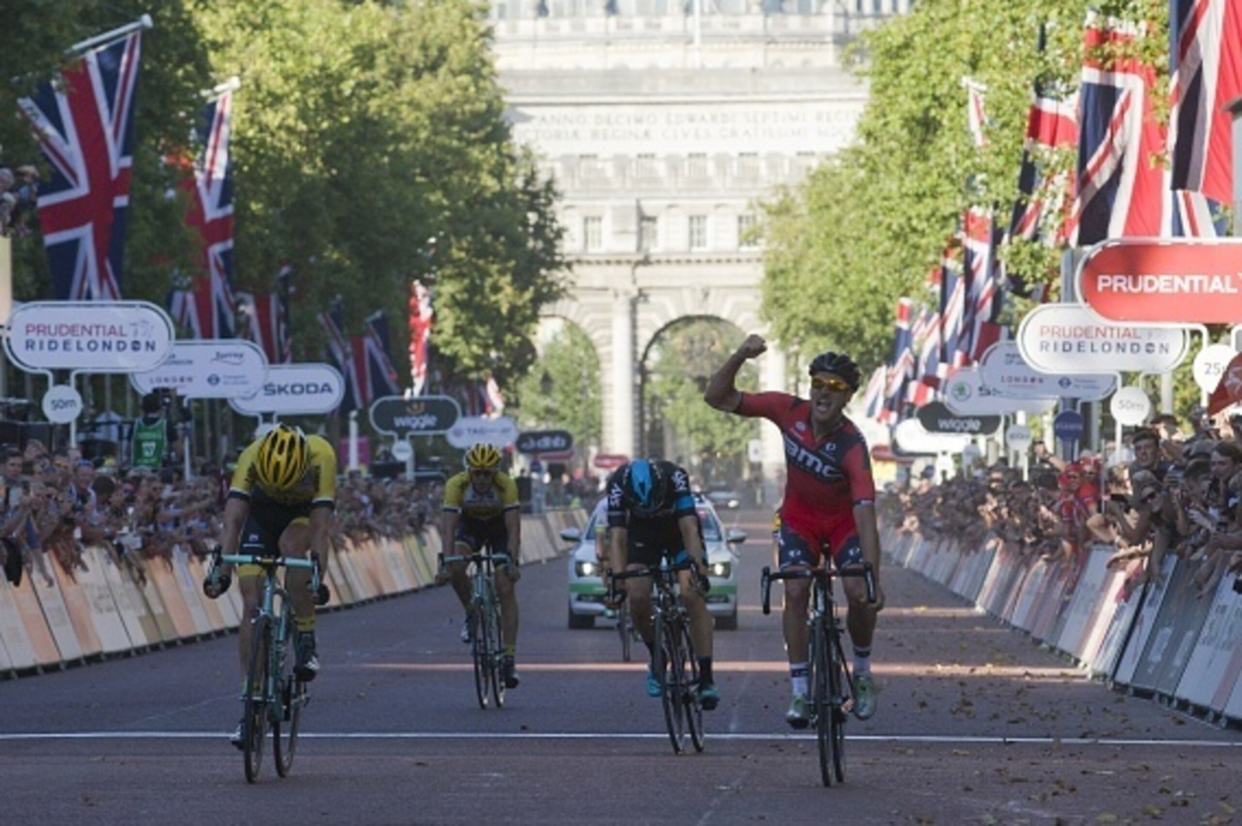 Luxembourg cyclist Jean-Pierre 'Jempy' Drucker (R) riding for BMC Racing, beats Dutch cyclist Mike Teunissen (L) riding for Team Lotto NL-Jumbo and British cyclist Ben Swift (2nd R) riding for Team Sky, to win the Ride London - Surrey Classic road cycle r