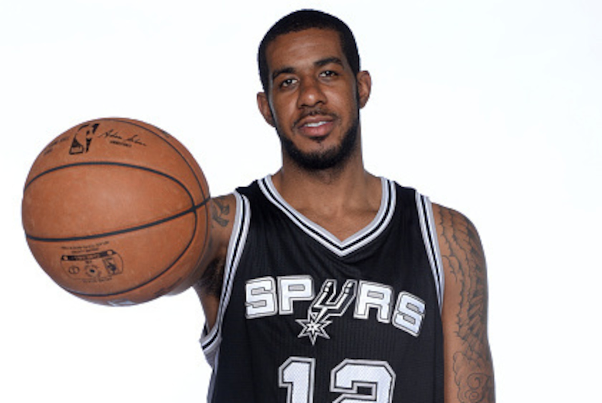 SAN ANTONIO, TX - JULY 10:  LaMarcus Aldridge of the San Antonio Spurs poses for a photo after a press conference on July 10, 2015 at the San Antonio Spurs Practice Facility in San Antonio, Texas. NOTE TO USER: User expressly acknowledges and agrees that,