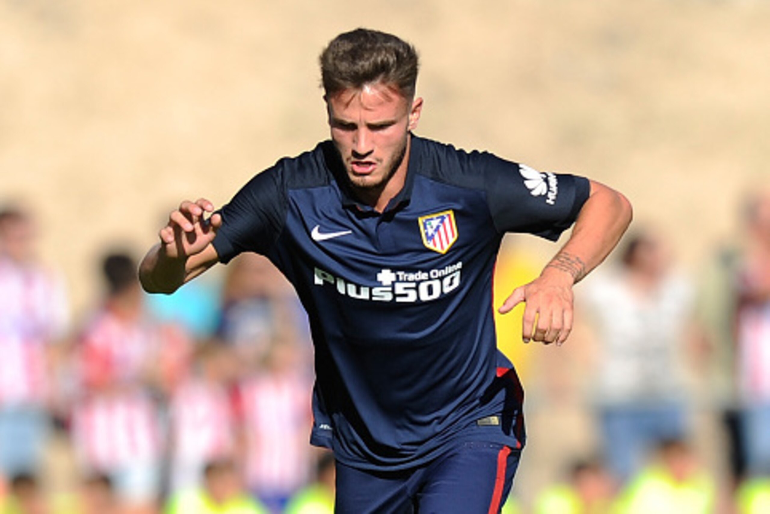 BURGO DE OSMA, SPAIN - JULY 25:  Saul Niguez of Club Atletico de Madrid in action during the Jesus Gil y Gil Memorial pre-season friendly match between Numancia and Club Atletico de Madrid at the Campo Municipal de Deportes on July 25, 2015 in Burgo de Os