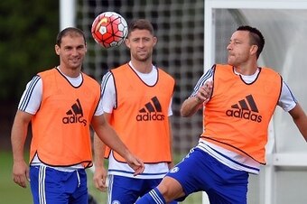 Chelsea's English midfielder John Terry (R) attends a team training session at Chelsea's training ground in Stoke D'Abernon, south of London, on July 31, 2015, ahead of their FA Community Shield match against Arsenal on Sunday. AFP PHOTO / GLYN KIRK

NOT 