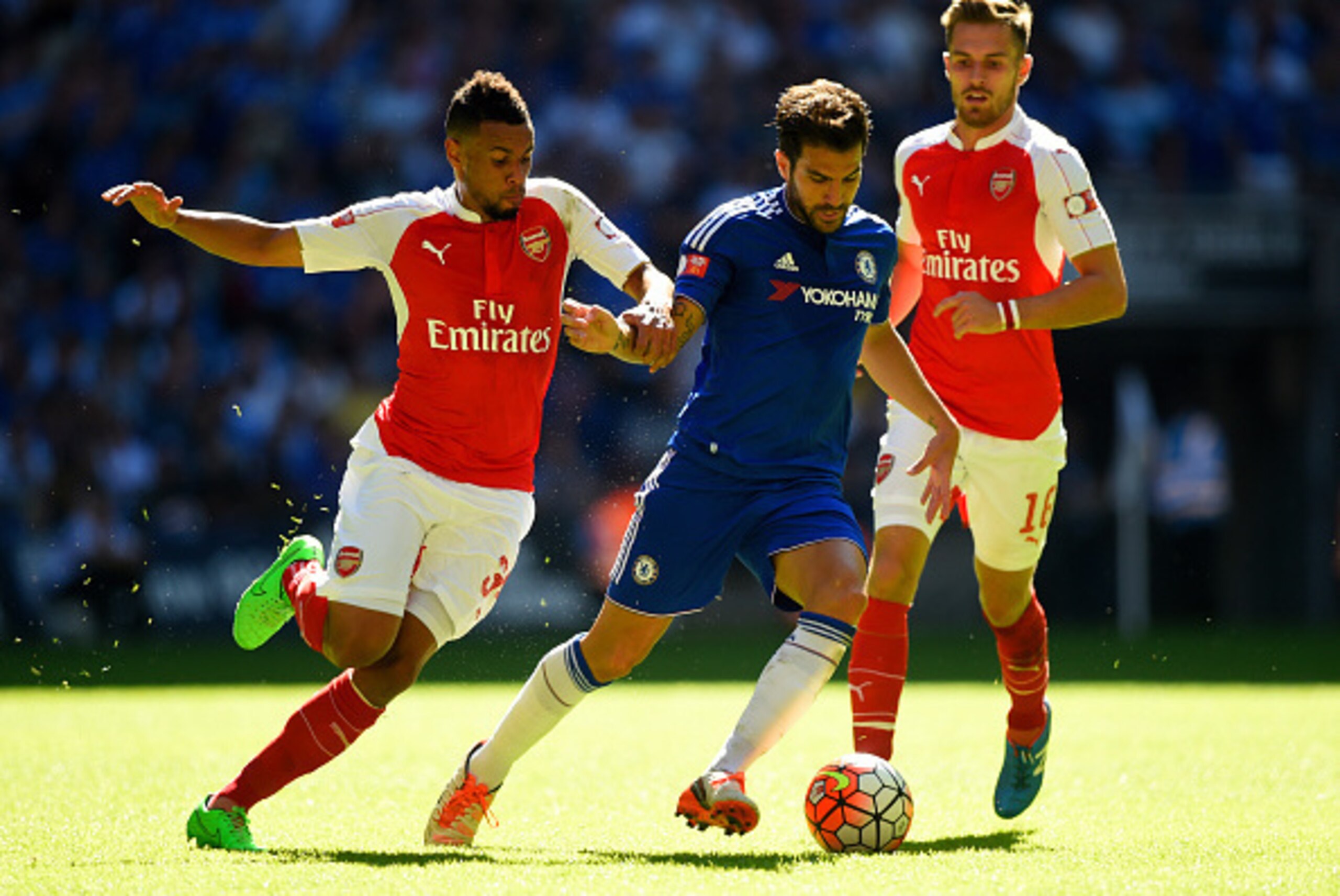LONDON, ENGLAND - AUGUST 02: Cesc Fabregas of Chelsea battles for the ball with Francis Coquelin of Arsenal and Aaron Ramsey of Arsenal during the FA Community Shield match between Chelsea and Arsenal at Wembley Stadium on August 2, 2015 in London, Engla LONDON, ENGLAND - AUGUST 02: Cesc Fabregas of Chelsea battles for the ball with Francis Coquelin of Arsenal and Aaron Ramsey of Arsenal during the FA Community Shield match between Chelsea and Arsenal at Wembley Stadium on August 2, 2015 in London, Engla