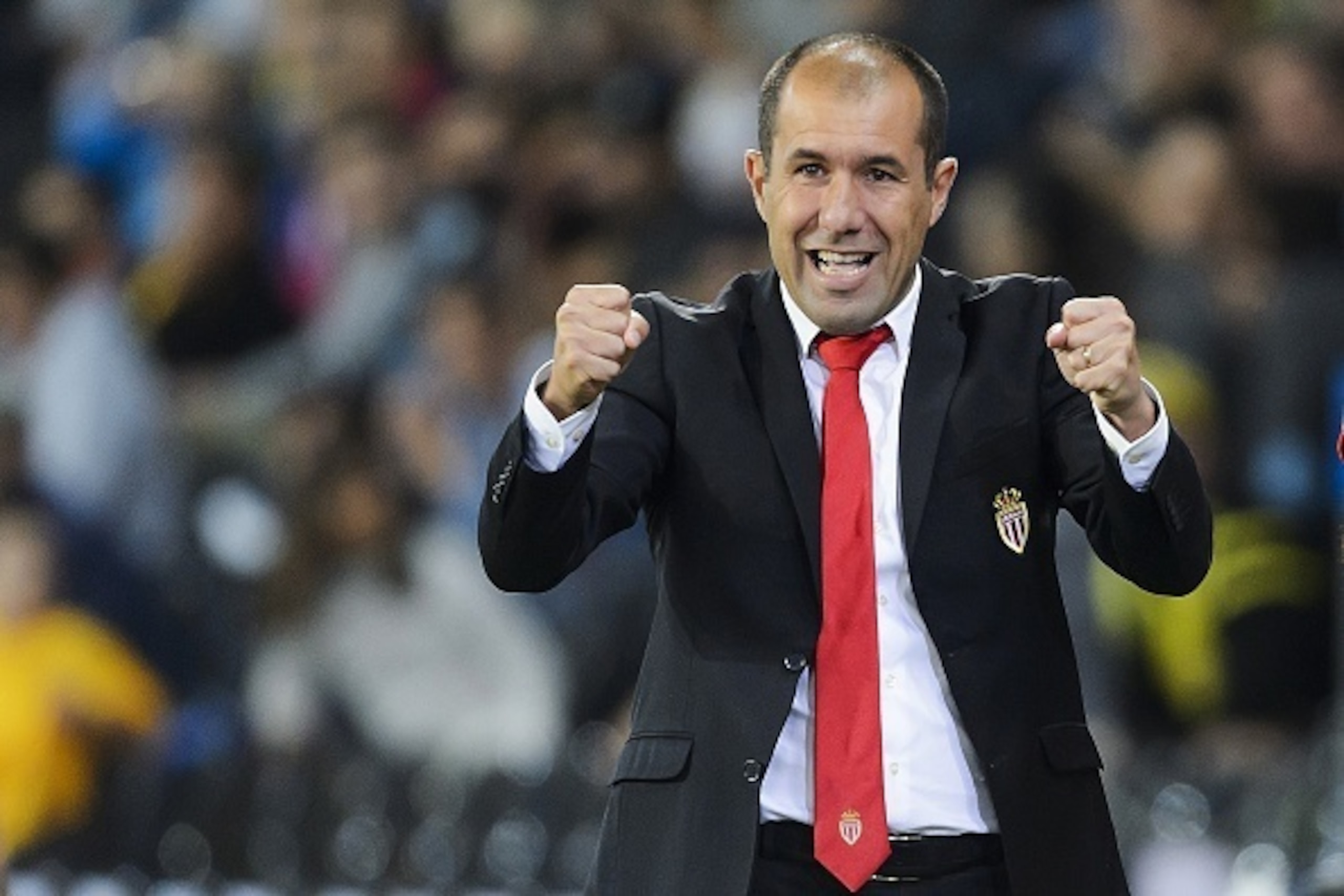 Monaco's Portuguese coach Leonardo Jardim reacts after the team's first goal during the UEFA Champions League third qualifying round first leg football match between BSC Young Boys and AS Monaco on July 28, 2015 at the Stade de Suisse in Bern.  AFP PHOTO 