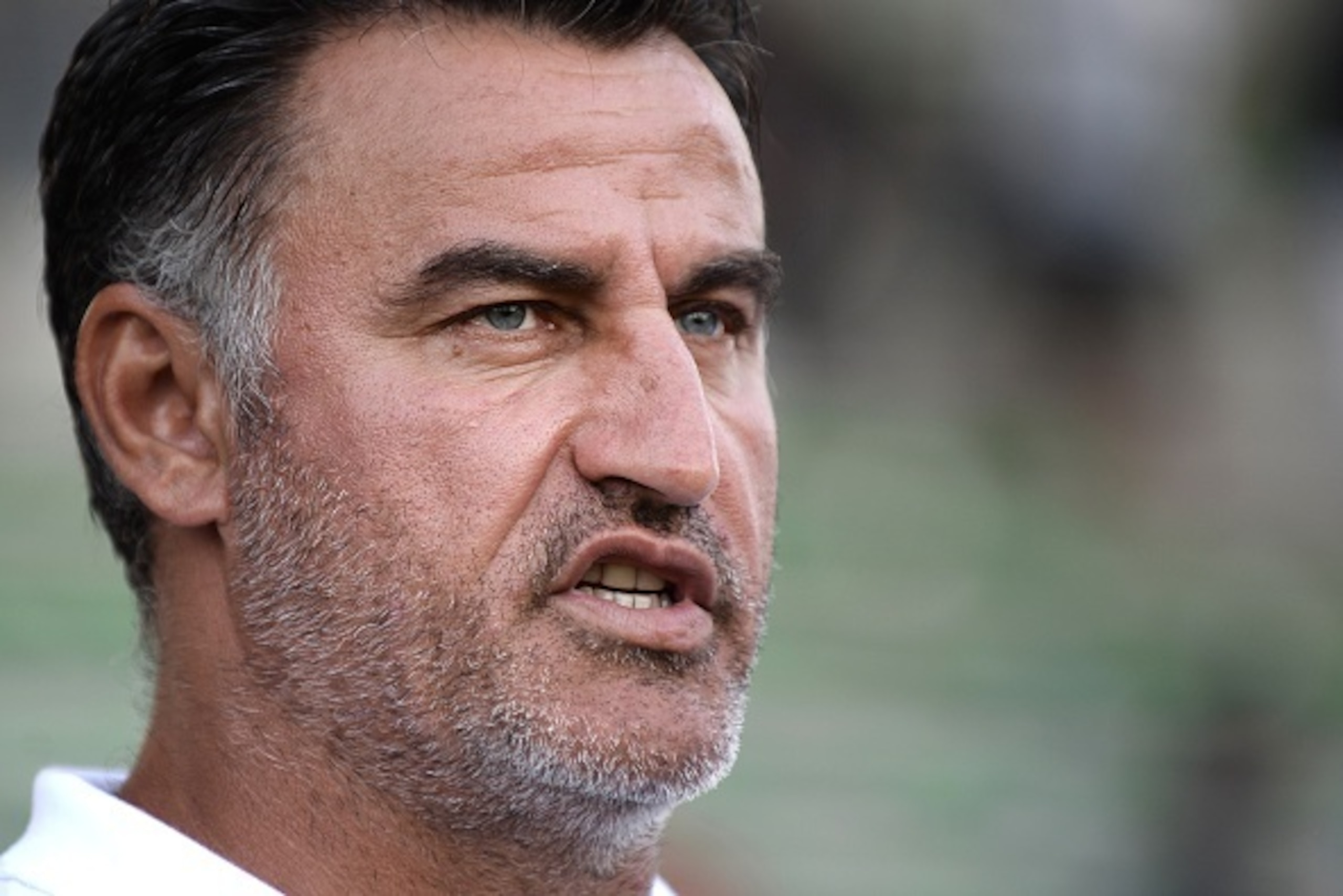 Saint-Etienne's French coach Christophe Galtier looks on during the friendly football match between Nantes (FCN) and Saint-Etienne (ASSE) on July 15, 2015 at the Rabine stadium in Vannes, western France. AFP PHOTO / JEAN-SEBASTIEN EVRARD        (Photo cre