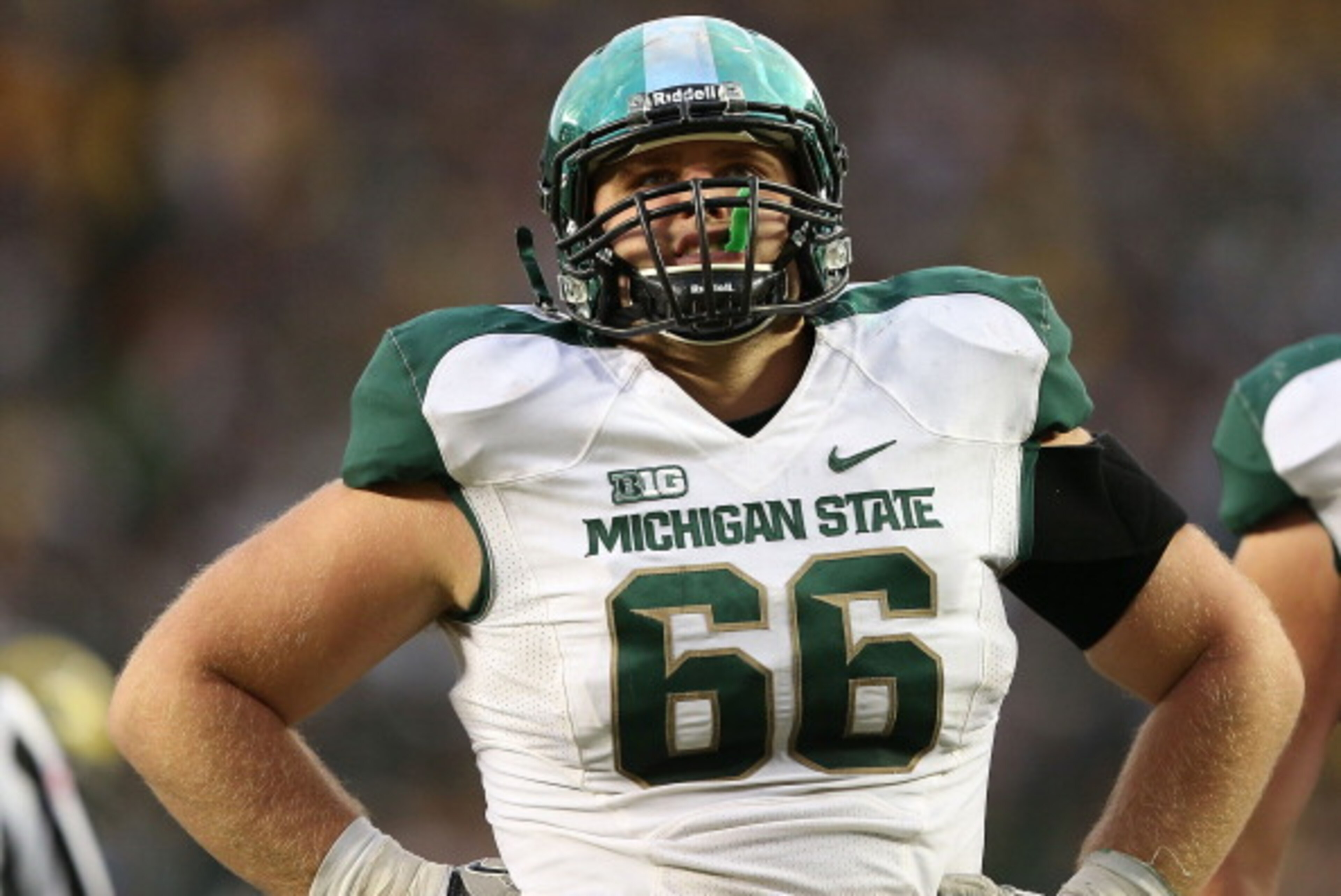 ANN ARBOR, MI - OCTOBER 20: Jake Allen #66 of the Michigan State Spartans watches the video board during the game against the Michigan Wolverines at Michigan Stadium on October 20, 2012 in Ann Arbor, Michigan. The Wolvereines defeated the Spartans 12-10. 