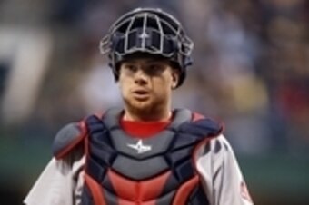 Sep 16, 2014; Pittsburgh, PA, USA; Boston Red Sox catcher Christian Vazquez (55) returns behind the plate against the Pittsburgh Pirates during the first inning at PNC Park. Mandatory Credit: Charles LeClaire-USA TODAY Sports