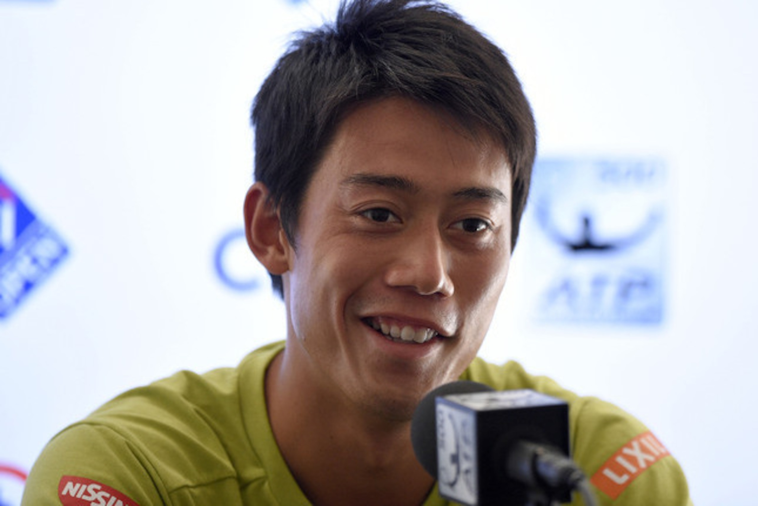Kei Nishikori speaks during a Citi Open press conference.