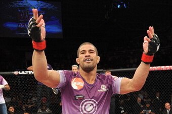 BARUERI, BRAZIL - OCTOBER 9:  Rousimar Palhares celebrates after defeating Mike Pierce (not pictured) in their welterweight bout during the UFC Fight Night event at the Ginasio Jose Correa on October 9, 2013 in Barueri, Sao Paulo, Brazil. (Photo by Jeff B