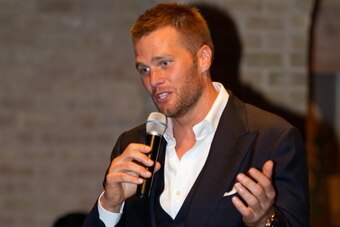 HOUSTON, TX - MAY 13:  Tom Brady takes questions from guests during a benefit for Best Buddies International, an international organization that helps people with intellectual disabilities to find employment and social opportunities on May 13, 2014 in Hou