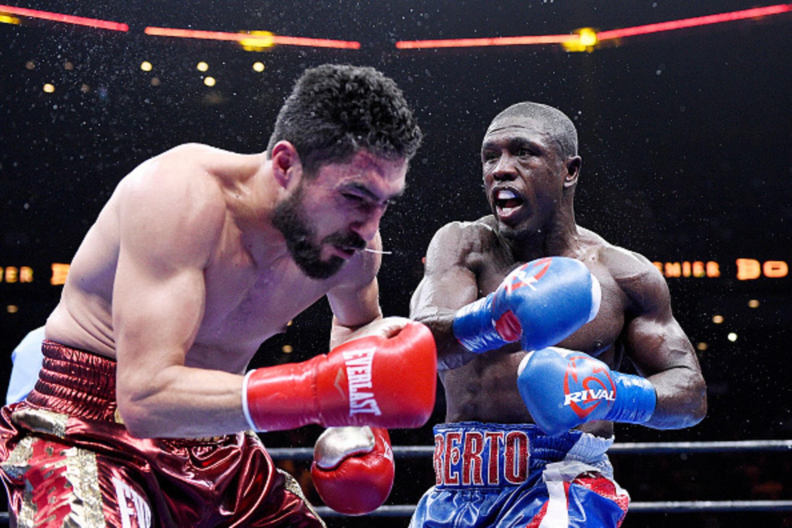 ONTARIO, CA - MARCH 13: Andre Berto (R) lands a punch against Josesito Lopez during their 12 round welterweight bout at Citizens Business Bank Arena March 13, 2015 in Ontario, California. Berto won by knock out. (Photo by Kevork Djansezian/Getty Images)