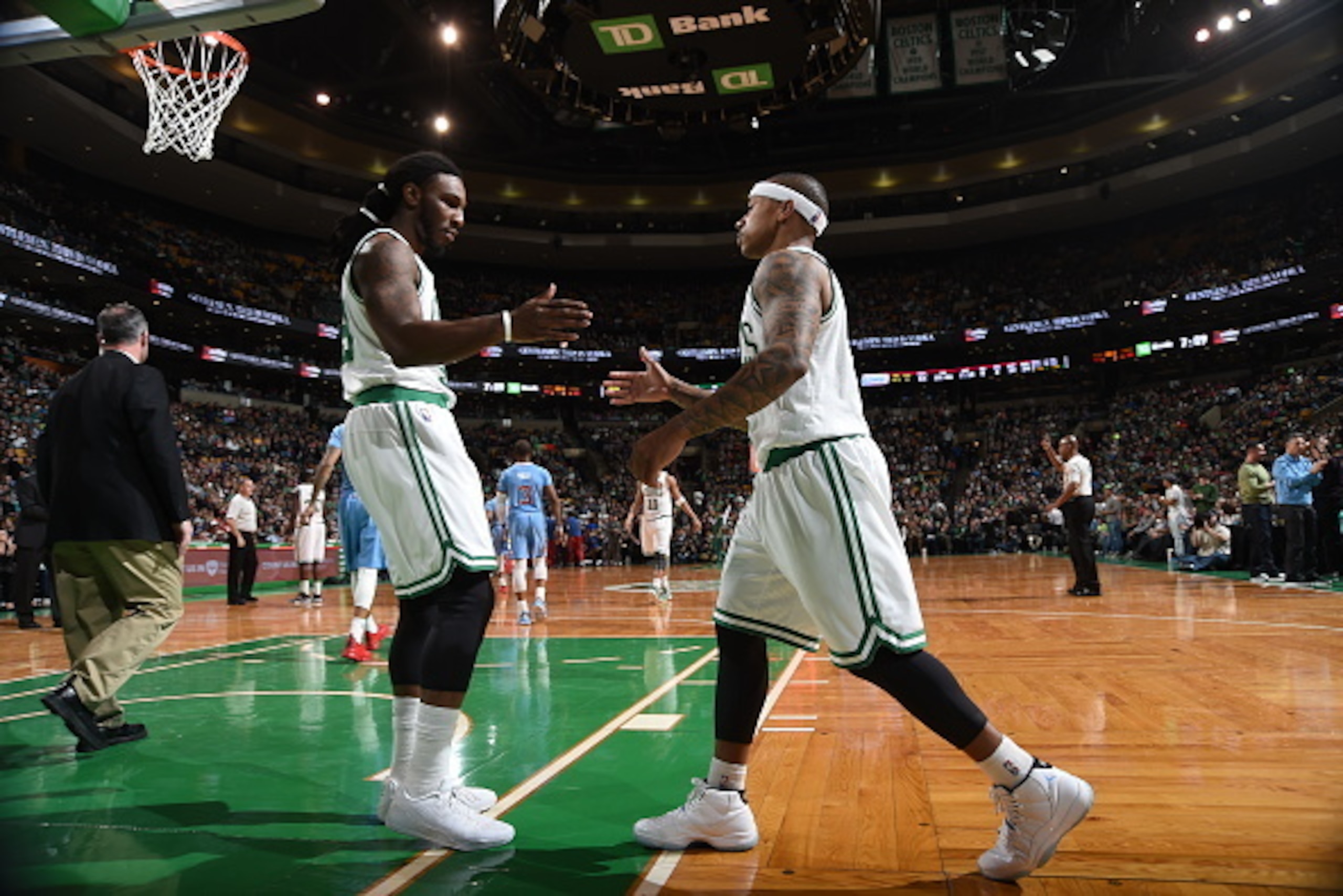 BOSTON, MA - MARCH 29: Jae Crowder #99 and Isaiah Thomas #4 of the Boston Celtics celebrate during a game against the Los Angeles Clippers on March 29, 2015 at TD Garden in Boston, Massachusetts.  NOTE TO USER: User expressly acknowledges and agrees that,