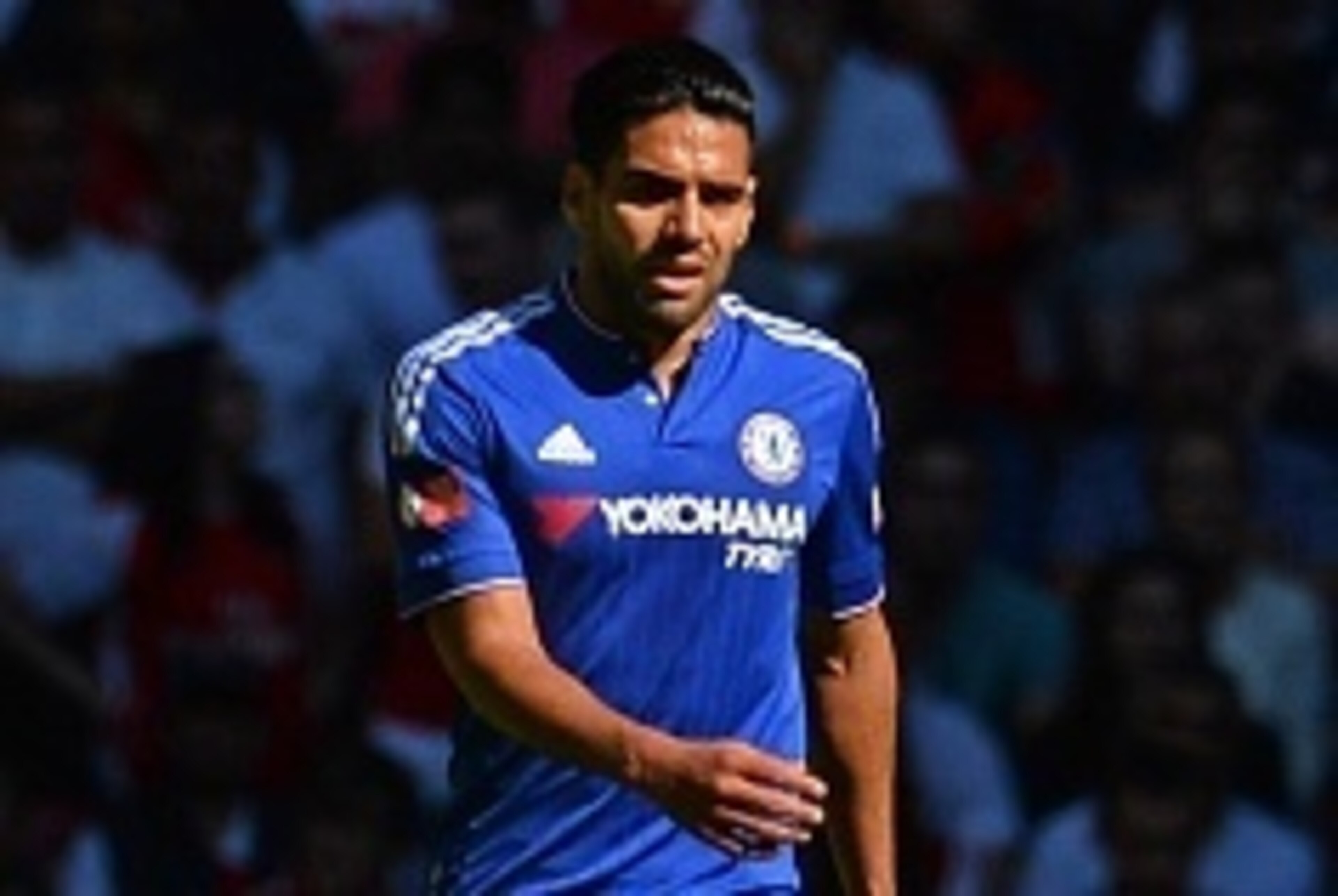 Chelsea's Colombian striker Radamel Falcao walks in the sunlight during the FA Community Shield football match between Arsenal and Chelsea at Wembley Stadium in north London on August 2, 2015. Arsenal won the game 1-0. AFP PHOTO / GLYN KIRK

 -- NOT FOR M