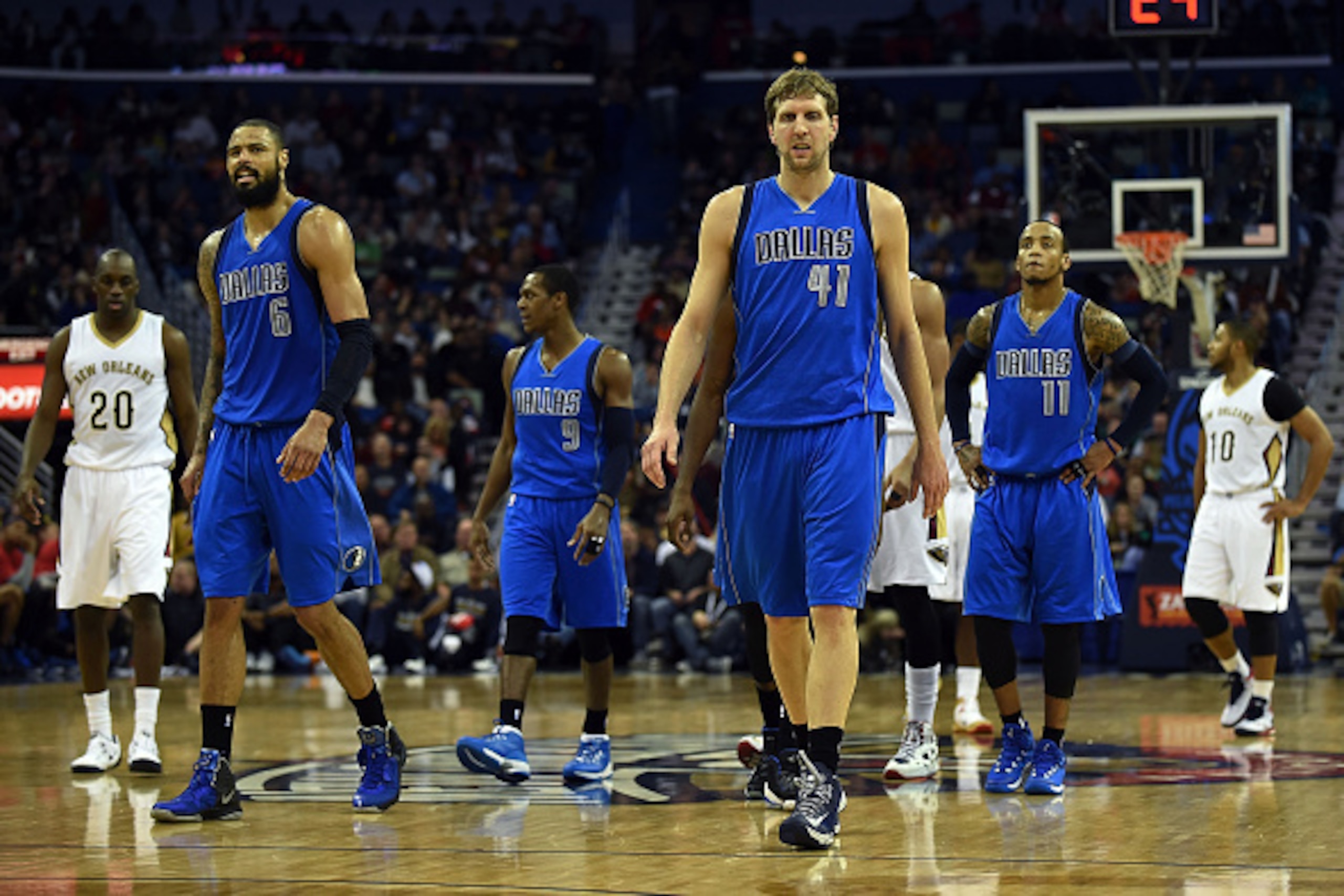NEW ORLEANS, LA - JANUARY 25:  Tyson Chandler #6, Rajon Rondo #9, Dirk Nowitzki #41 and Monta Ellis #11 of the Dallas Mavericks take the court following a timeout during the second half of a game against the New Orleans Pelicans at the Smoothie King Cente