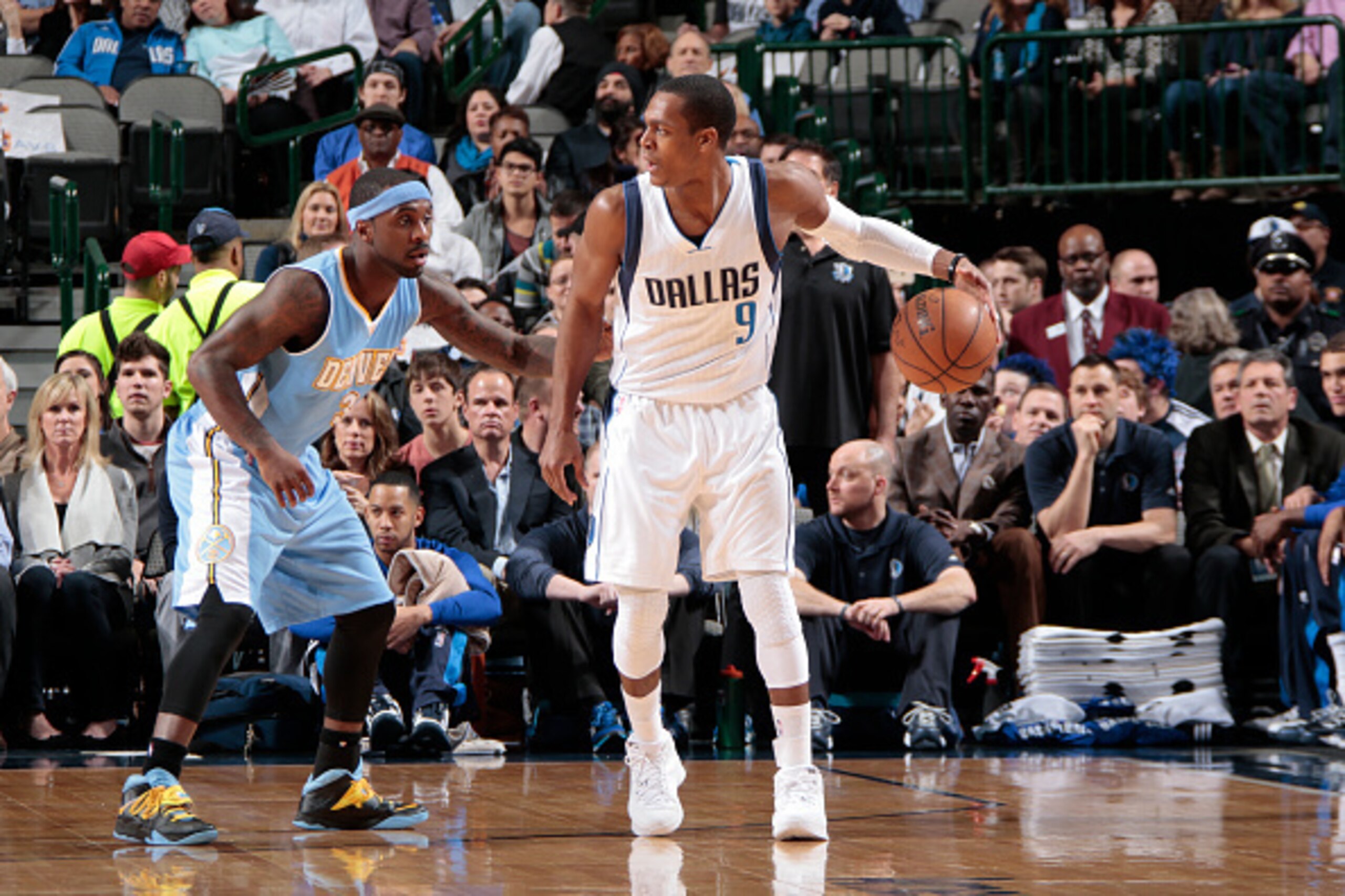 DALLAS, TX - JANUARY 16: Rajon Rondo #9 of the Dallas Mavericks handles the ball against Ty Lawson #3 of the Denver Nuggets during the game on January 16, 2015 at the American Airlines Center in Dallas, Texas. NOTE TO USER: User expressly acknowledges and