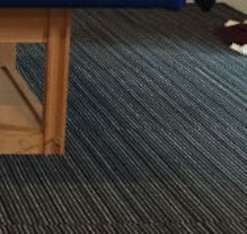 Marbury, with the Chinese tattoo meaning "Beijing Dynasty" down his left side, getting soft tissue work by massage therapist Rachel Saydak.