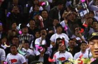 Marbury and his teammates in March after winning back-to-back championships, and their third in four years.