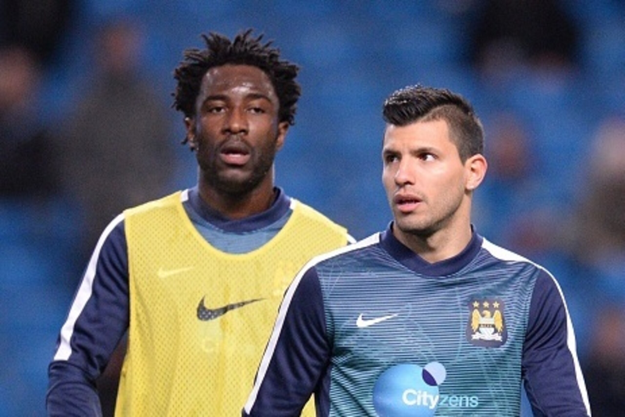 Manchester City's Argentinian striker Sergio Aguero (R) and Manchester City's Ivorian striker Wilfried Bony warm up prior to the English Premier League football match between Manchester City and Leicester City at the Etihad Stadium in Manchester, north we