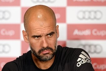 Bayern Munich's Spanish headcoach Pep Guardiola addresses a press conference on the football Audi Cup in Munich, southern Germany, on August 3, 2015. The Audi Cup football matches with Bayern Munich of Germany, Real Madrid of Spain, AC Milan of Italy and 