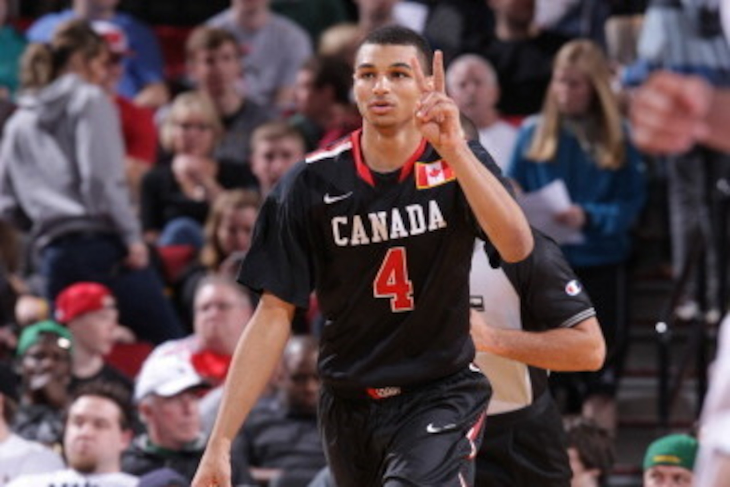 PORTLAND, OR - APRIL 12:  Jamal Murray #4 of the World Team dribbles the ball during the game against Team USA on April 12, 2014 at the Moda Center Arena in Portland, Oregon. NOTE TO USER: User expressly acknowledges and agrees that, by downloading and or