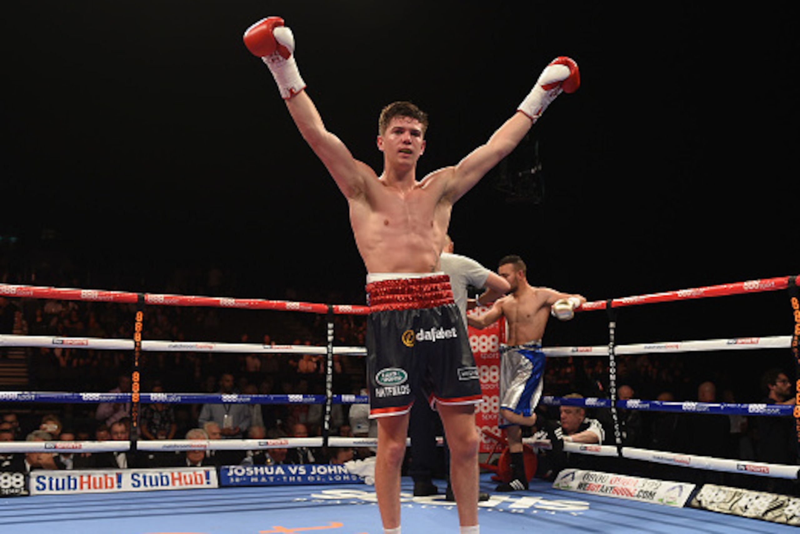 BIRMINGHAM, ENGLAND - MAY 09:  Luke Campbell (Black Short) celebrates his victory over Aboubeker Bechelaghem during the Lightweight Contest during Resurrection Fight Night at Barclaycard Arena on May 9, 2015 in Birmingham, England.  (Photo by Christopher 