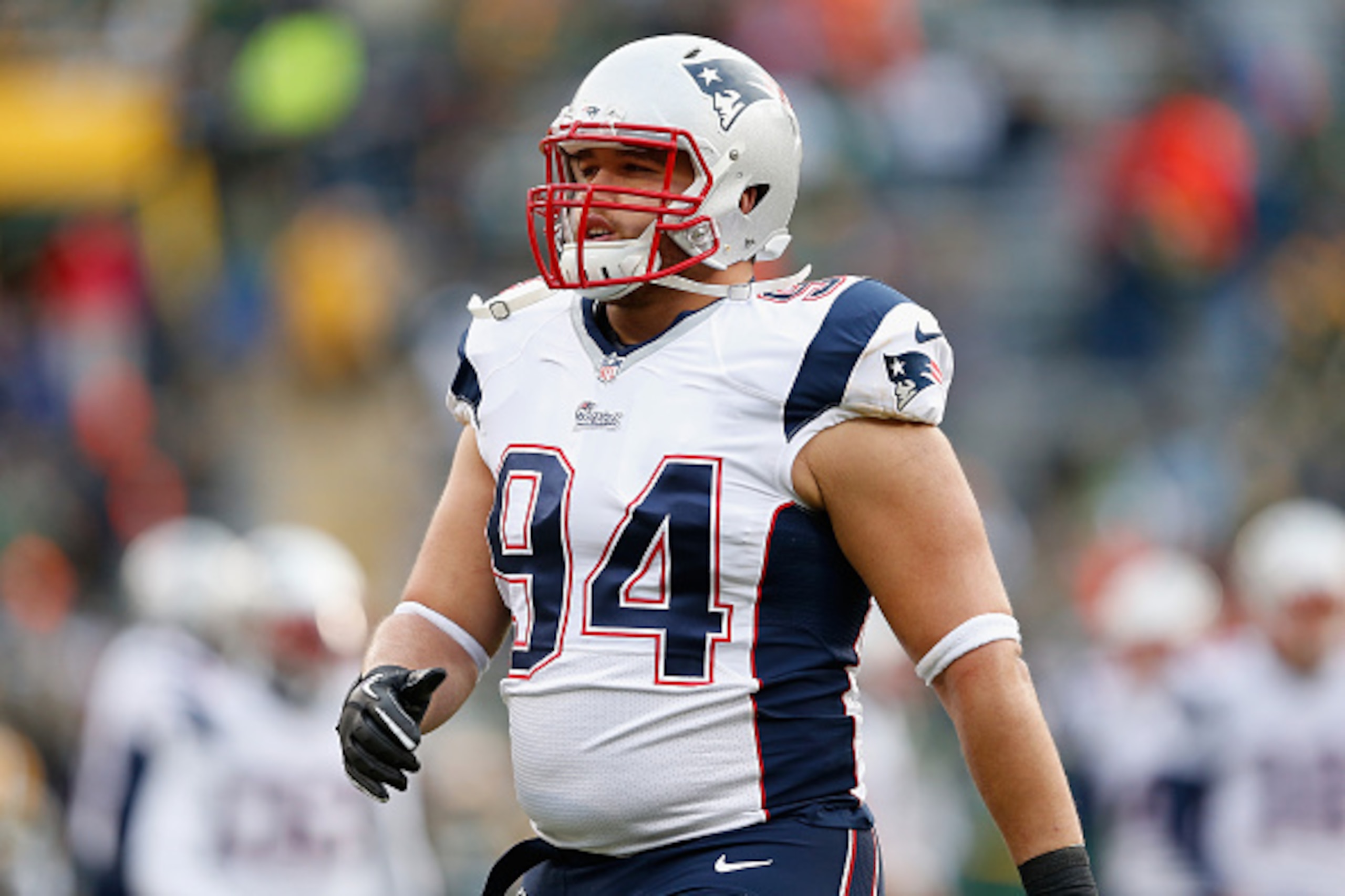 GREEN BAY, WI - NOVEMBER 30:  Defensive tackle Chris Jones #94 of the New England Patriots  warms up before the NFL game against the Green Bay Packers at Lambeau Field on November 30, 2014 in Green Bay, Wisconsin.  The Packers defeated the Patriots 26-21.