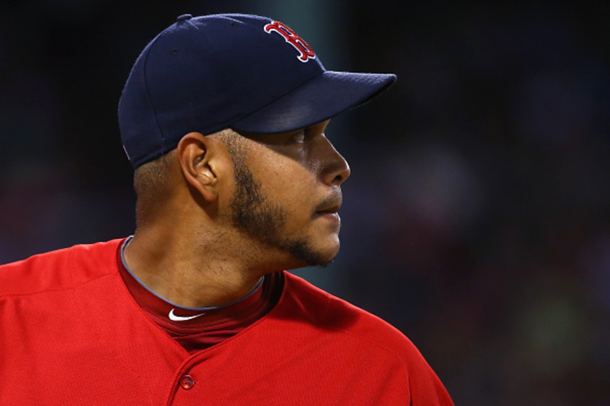 BOSTON, MA - JULY 31:  Eduardo Rodriguez #52 of the Boston Red Sox walks to the dugout during the fourth inning against the Tampa Bay Rays at Fenway Park on July 31, 2015 in Boston, Massachusetts.  (Photo by Maddie Meyer/Getty Images)