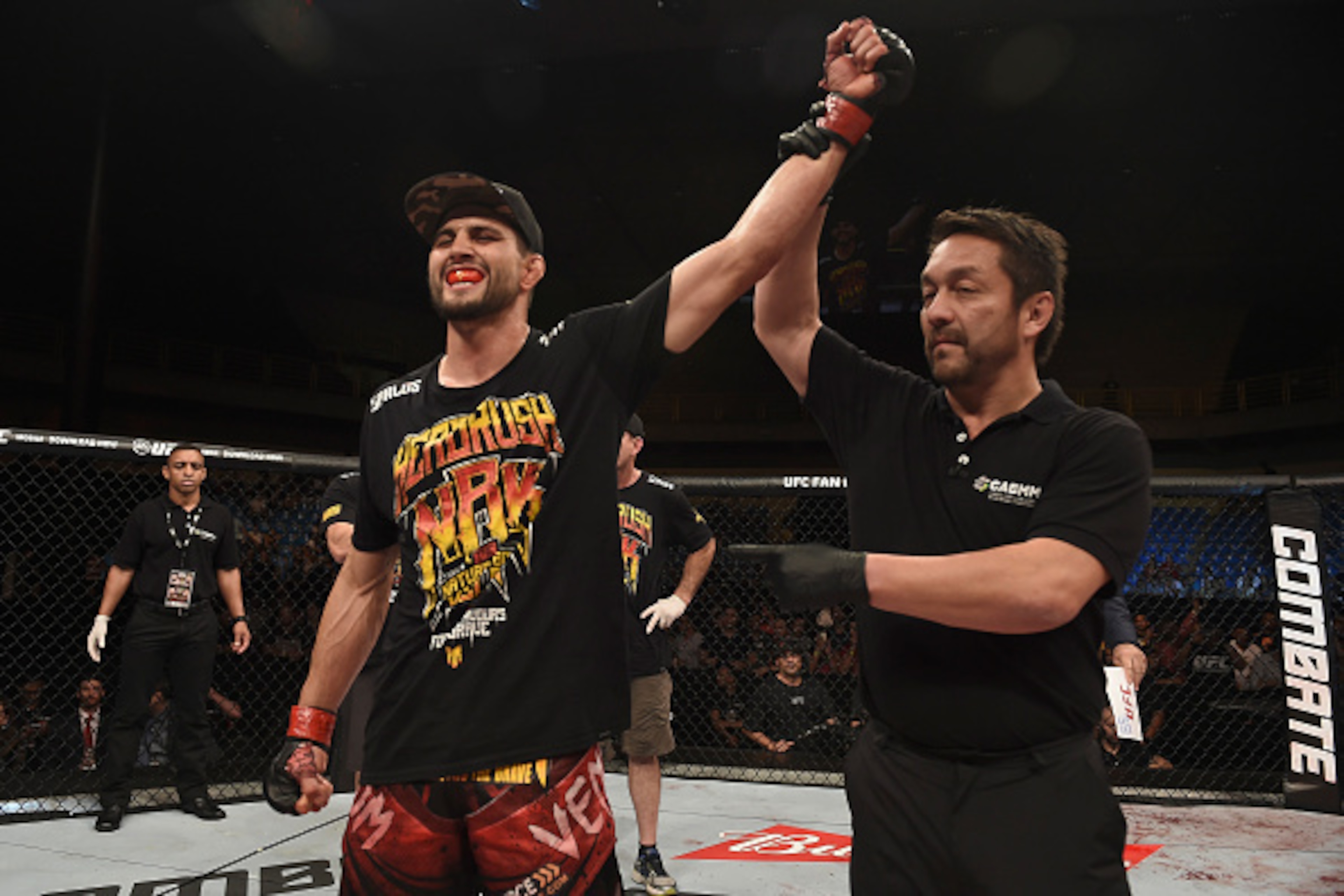 GOIANIA, BRAZIL - MAY 30:  Carlos Condit of the United States celebrates victory over Thiago Alves of Brazil in their welterweight UFC bout during the UFC Fight Night event at Arena Goiania on May 30, 2015 in Goiania, Brazil.  (Photo by Buda Mendes/Zuffa 