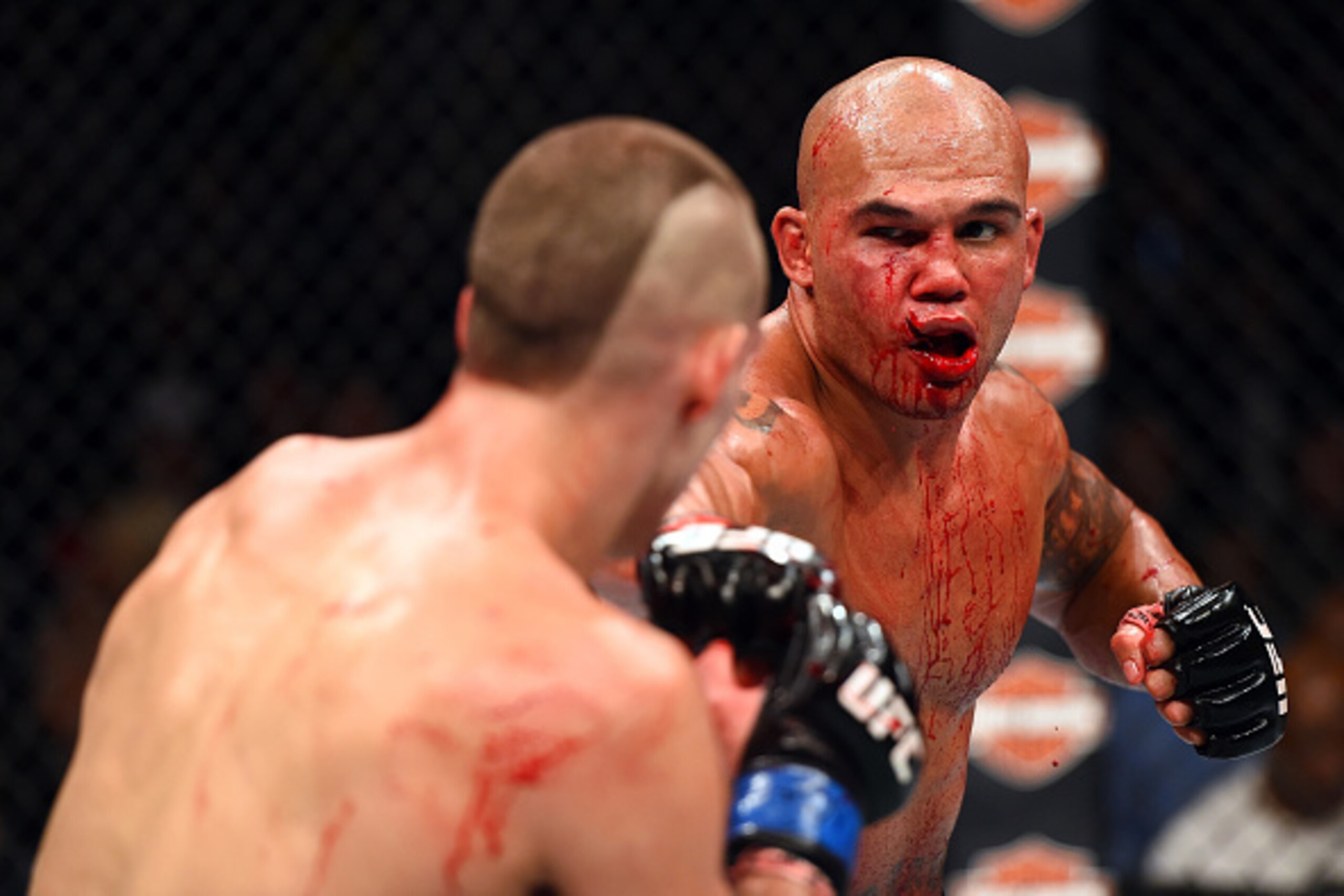 LAS VEGAS, NV - JULY 11:  (R-L) Robbie Lawler punches Rory MacDonald in their UFC welterweight title fight during the UFC 189 event inside MGM Grand Garden Arena on July 11, 2015 in Las Vegas, Nevada.  (Photo by Josh Hedges/Zuffa LLC/Zuffa LLC via Getty I