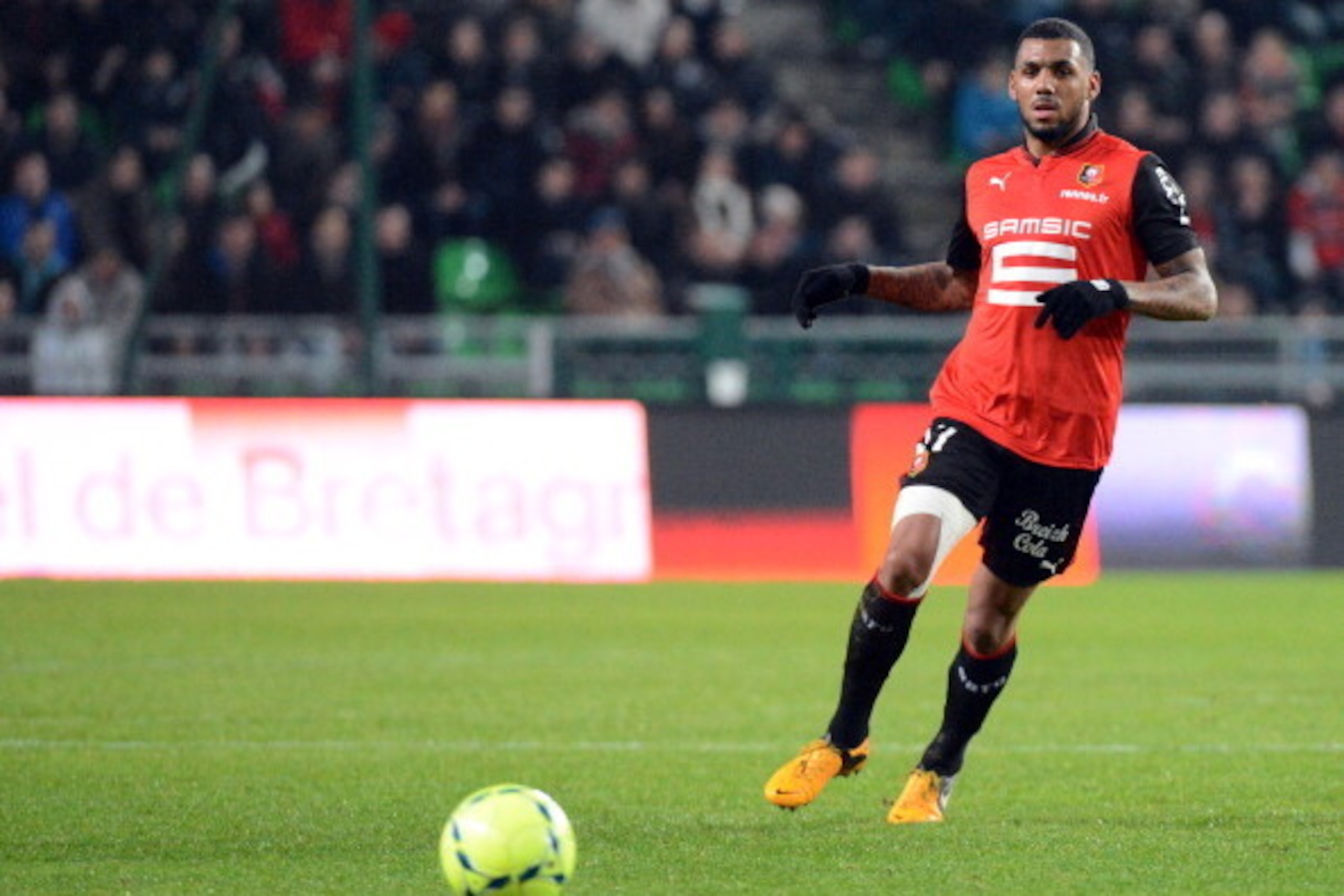 Rennes' French midfielder Yann M'vila looks at the ball during the French L1 football match between Rennes and Bordeaux on January 12, 2013, at the Route de Lorient stadium in Rennes, western France. AFP PHOTO / DAMIEN MEYER        (Photo credit should re