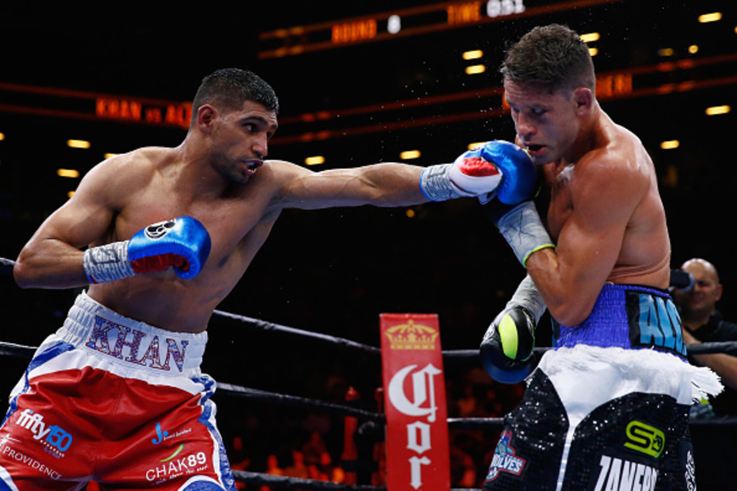 NEW YORK, NY - MAY 29:  Amir Khan punches Chris Algieri during their Welterweight bout at Barclays Center of Brooklyn on May 29, 2015 in New York City.  (Photo by Al Bello/Getty Images)