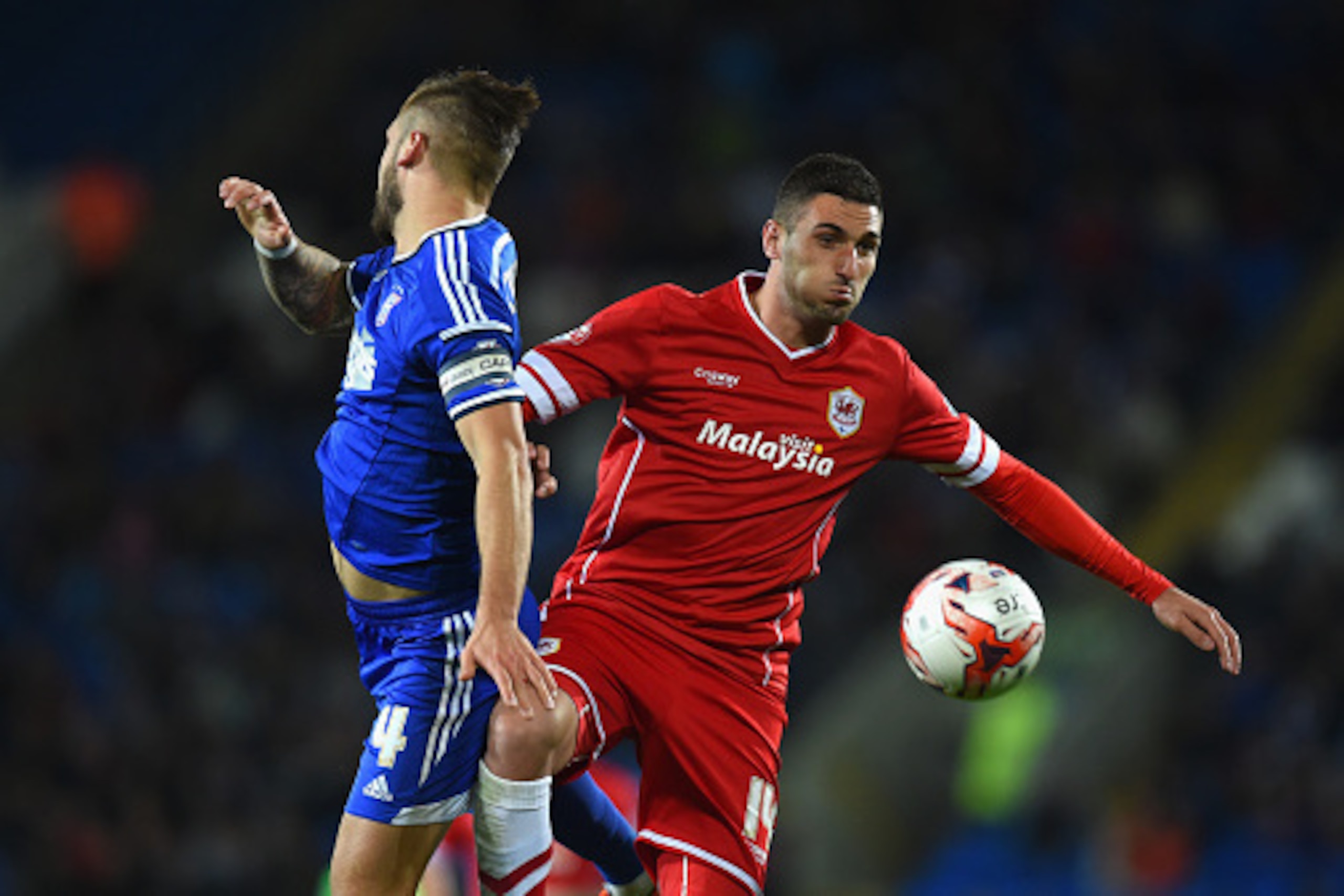 CARDIFF, WALES - OCTOBER 21:  Cardiff player Federico Macheda (r) challenges Luke Chambers during the Sky Bet Championship match between Cardiff City and Ipswich Town at Cardiff City Stadium on October 21, 2014 in Cardiff, Wales.  (Photo by Stu Forster/Ge
