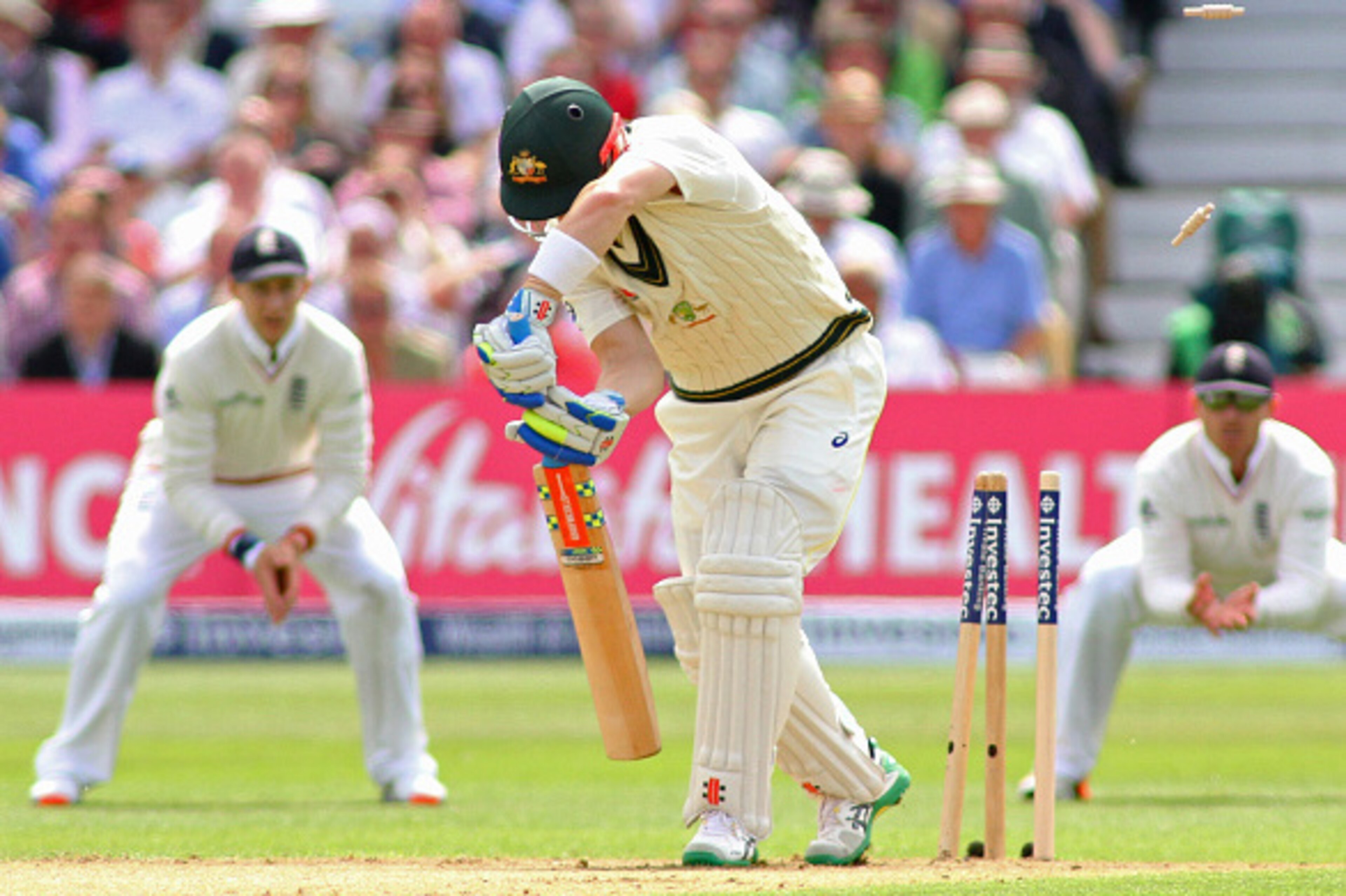 NOTTINGHAM, ENGLAND - AUGUST 6: Peter Nevill of Australia is bowled out by Steven Finn of England during day one of the 4th Investec Ashes Test match between England and Australia at Trent Bridge on August 6, 2015 in Nottingham, United Kingdom. (Photo by 