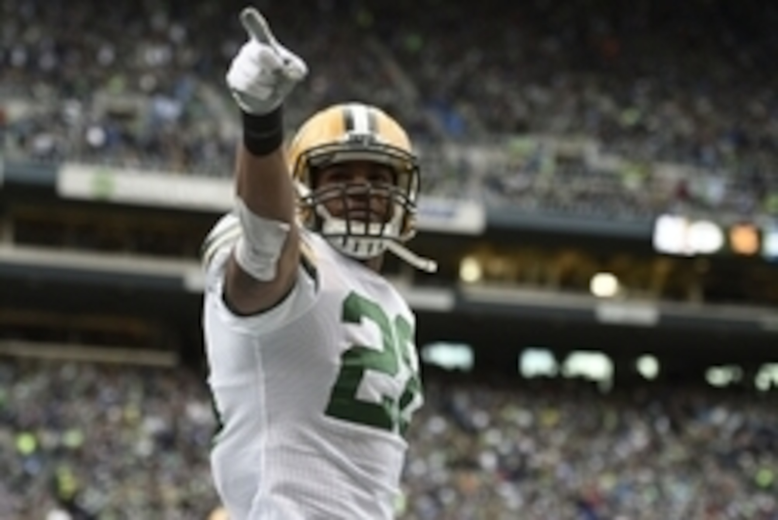 January 18, 2015; Seattle, WA, USA; Green Bay Packers safety Sean Richardson (28) reacts after cornerback Sam Shields (37) intercepts a pass against the Seattle Seahawks during the first half in the NFC Championship game at CenturyLink Field. Mandatory Cr