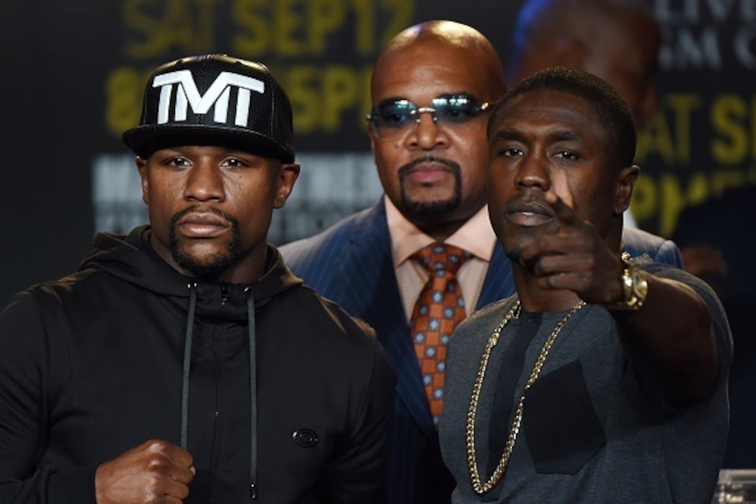 Boxers Floyd 'Money' Mayweather (L) and Andre Berto (R) face off during a press conference to officially announce their September 12 fight that will place at the MGM Grand Garden Arena in Las Vegas, at the Marriott Hotel in Los Angeles, California on Augu