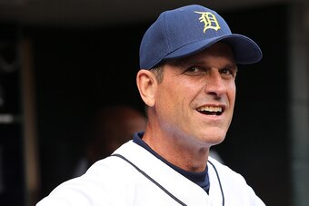 DETROIT, MI - JUNE 30: University of Michigan Jim Harbaugh gets ready to throw out the first pitch prior to the start of the game between the Pittsburgh Pirates and the Detroit Tigers on June 30, 2015 at Comerica Park in Detroit, Michigan. The Pirates def