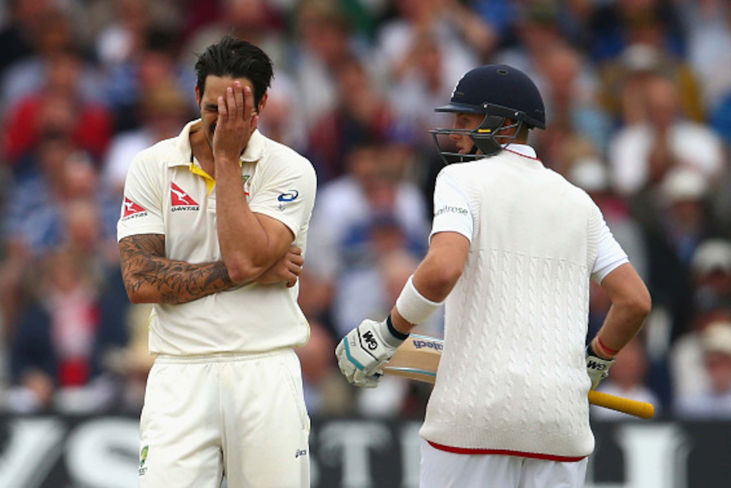 NOTTINGHAM, ENGLAND - AUGUST 07:  Mitchell Johnson of Australia reacts while bowling as Joe Root of England runs between wickets during day two of the 4th Investec Ashes Test match between England and Australia at Trent Bridge on August 7, 2015 in Notting