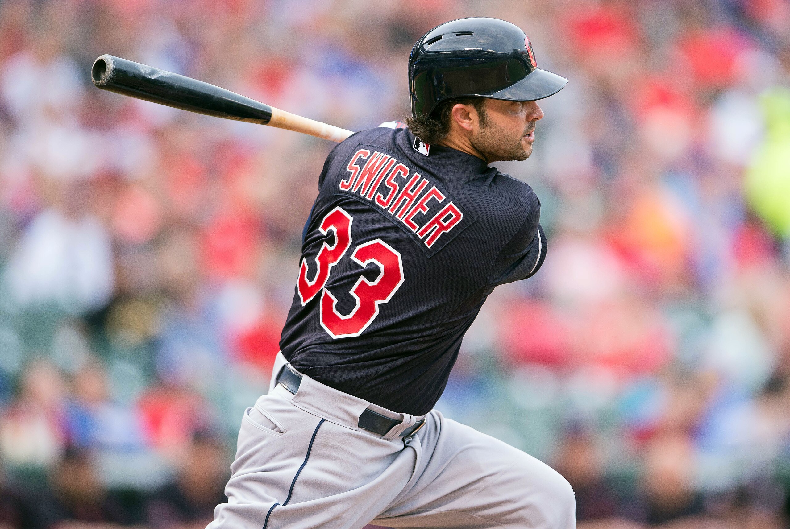 May 15, 2015; Arlington, TX, USA; Cleveland Indians designated hitter Nick Swisher (33) hits a double and drives in a run against the Texas Rangers during the first inning at Globe Life Park in Arlington. Mandatory Credit: Jerome Miron-USA TODAY Sports